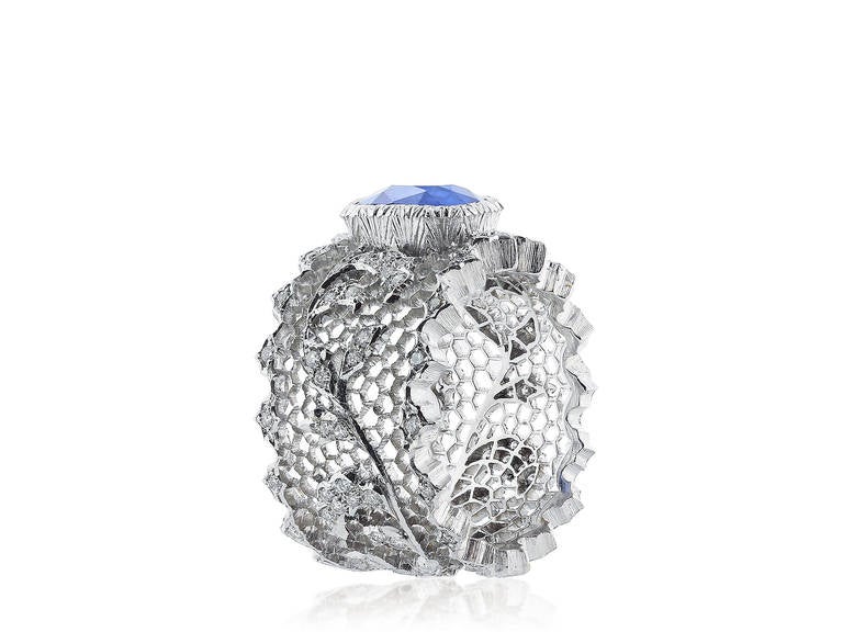 Elegant and rare filigree 18k white gold ring crafted by the famed house of Buccellati set with a 2.75 Carat gem quality cornflower blue sapphire with AGL cert # CS 62273 centered on an elaborate diamond and open work band.