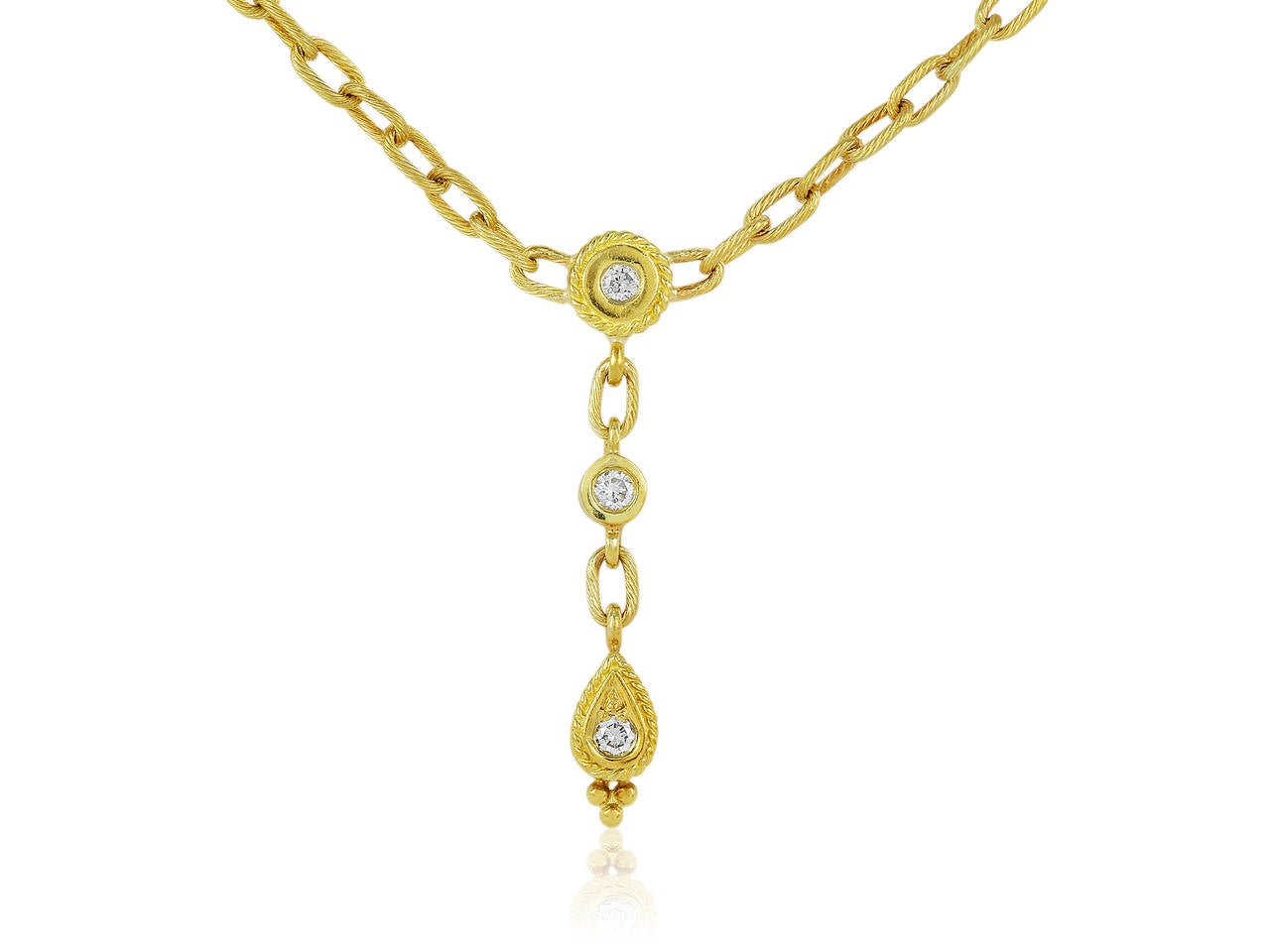 Penny Preville 18 karat yellow gold oval link chain necklace consisting of 3 circular stations and a pendant drop featuring a marquise shape, all accented with rope or decorative borders and a total of 7 full cut round diamonds.
