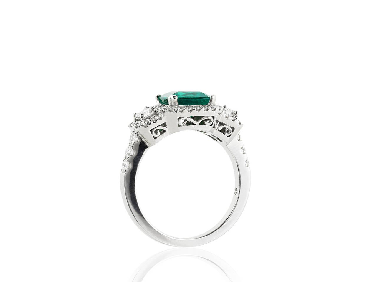 1.63 Carat Emerald Diamond Gold Three Stone Ring For Sale at 1stDibs