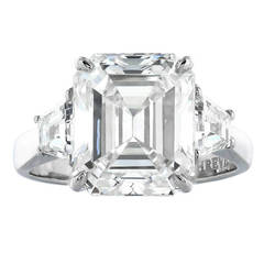 5.90 Carat Emerald Cut Diamond Three Stone Ring