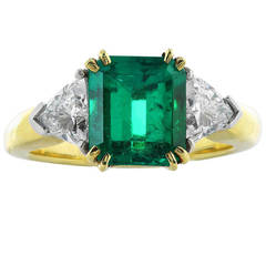 2.47 Carat Emerald Diamond Gold Platinum Three Stone Ring