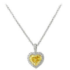 1.15 Carat GIA Cert Fancy Intense Yellow Diamond Gold Platinum Heart Pendant