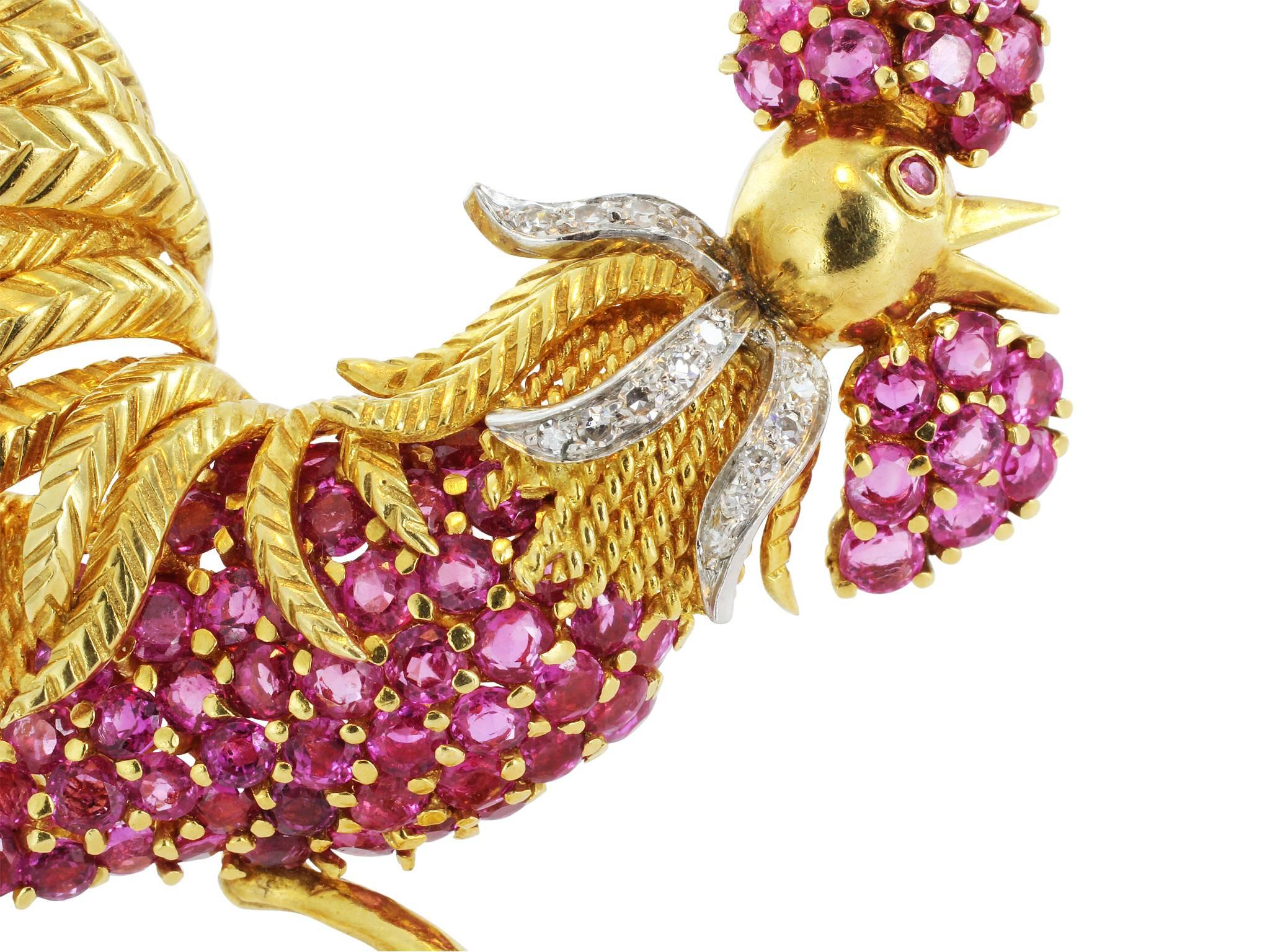 Platinum & 18kt yellow gold vintage rooster pin consisting of approximately 3.20 carats total weight of Burma rubies and approximately .28 carats carats of single cut diamonds.