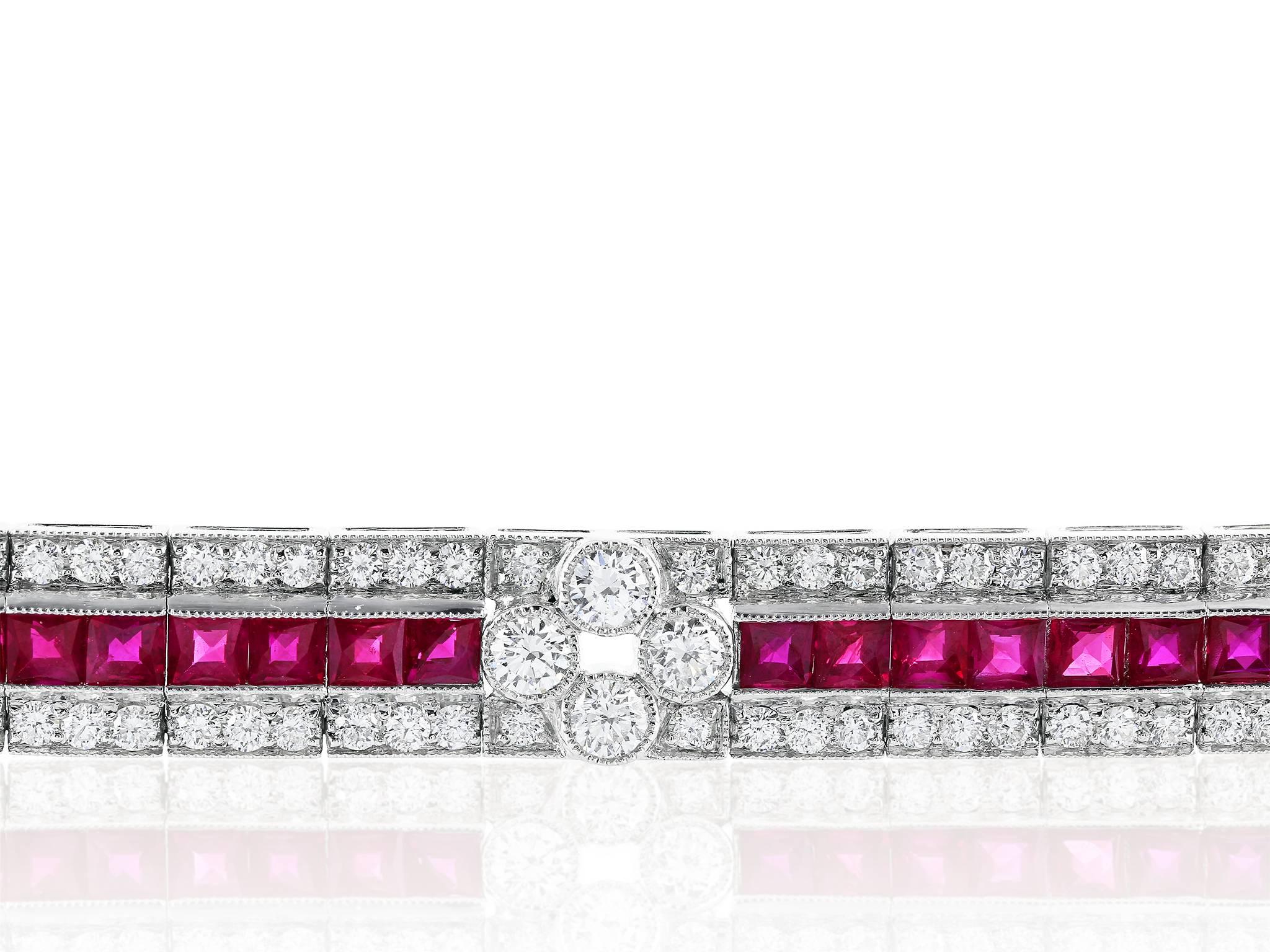Platinum art deco style flexible bracelet consisting of 172 round brilliant cut diamond having a total weight of 5.11 carats having a color and clarity of F/VS2 respectively set with a center row of 44 french cut rubies having a total weight of 8.06