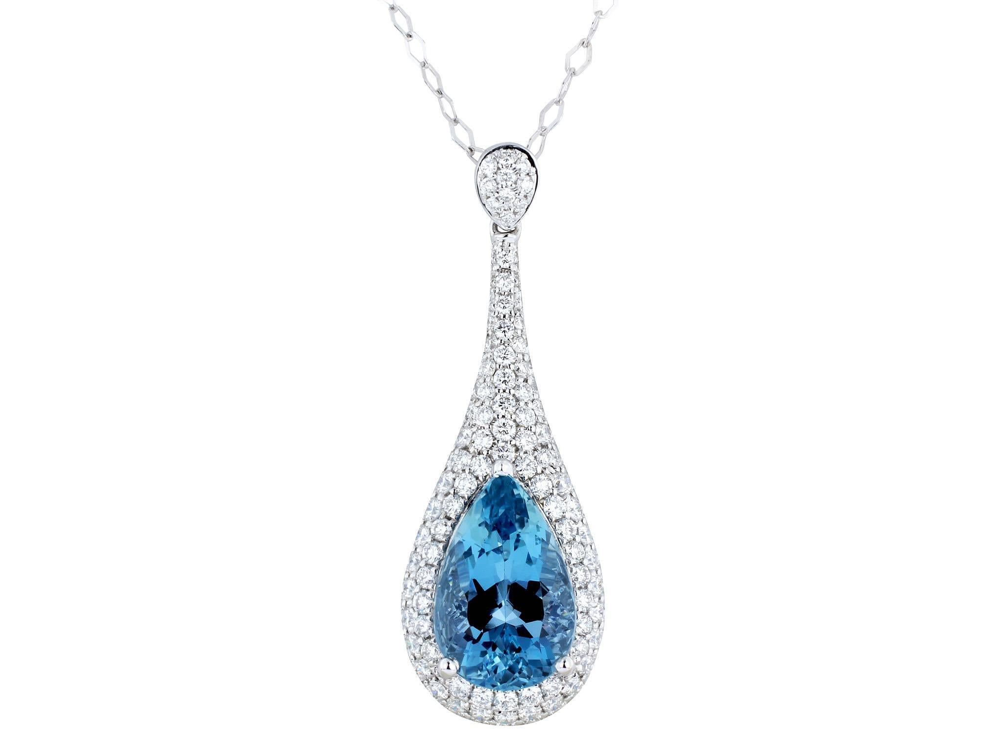 18 karat white gold drop pendant consisting of 1 pear shape aquamarine weighing 3.26 carats set with 1.20 carats total weight of round brilliant cut diamond accents.
