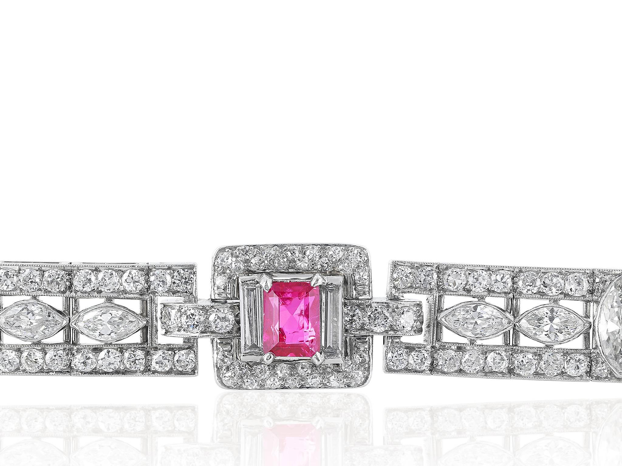 Platinum Art Deco bracelet consisting of 3 emerald cut rubies having a total weight of approximately 4.50 carats set with approximately 11.50 carats of diamond.