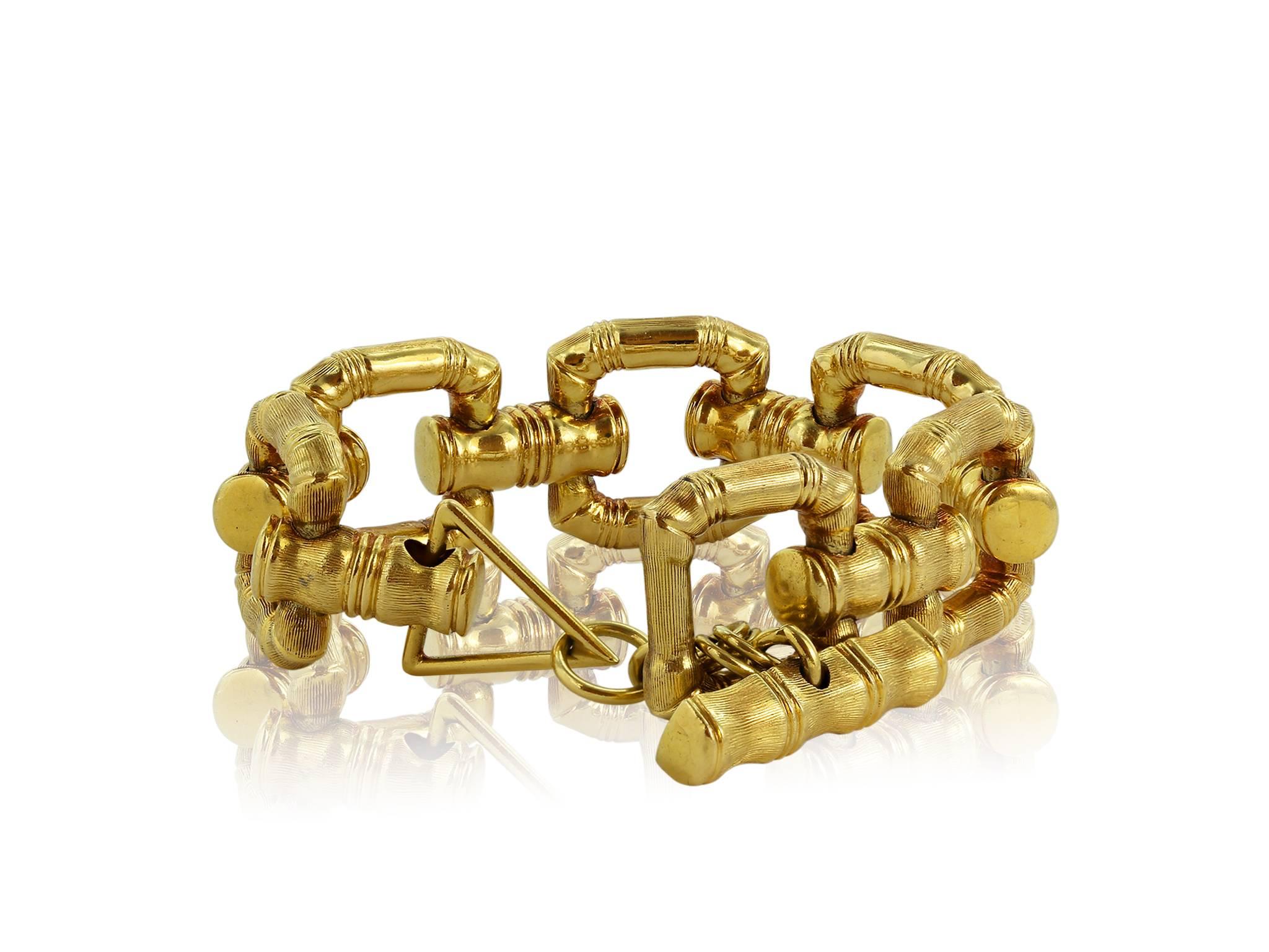18 karat yellow gold link square link bracelet bamboo style with a toggle clasp. 8.5 inches 35.72dwt.