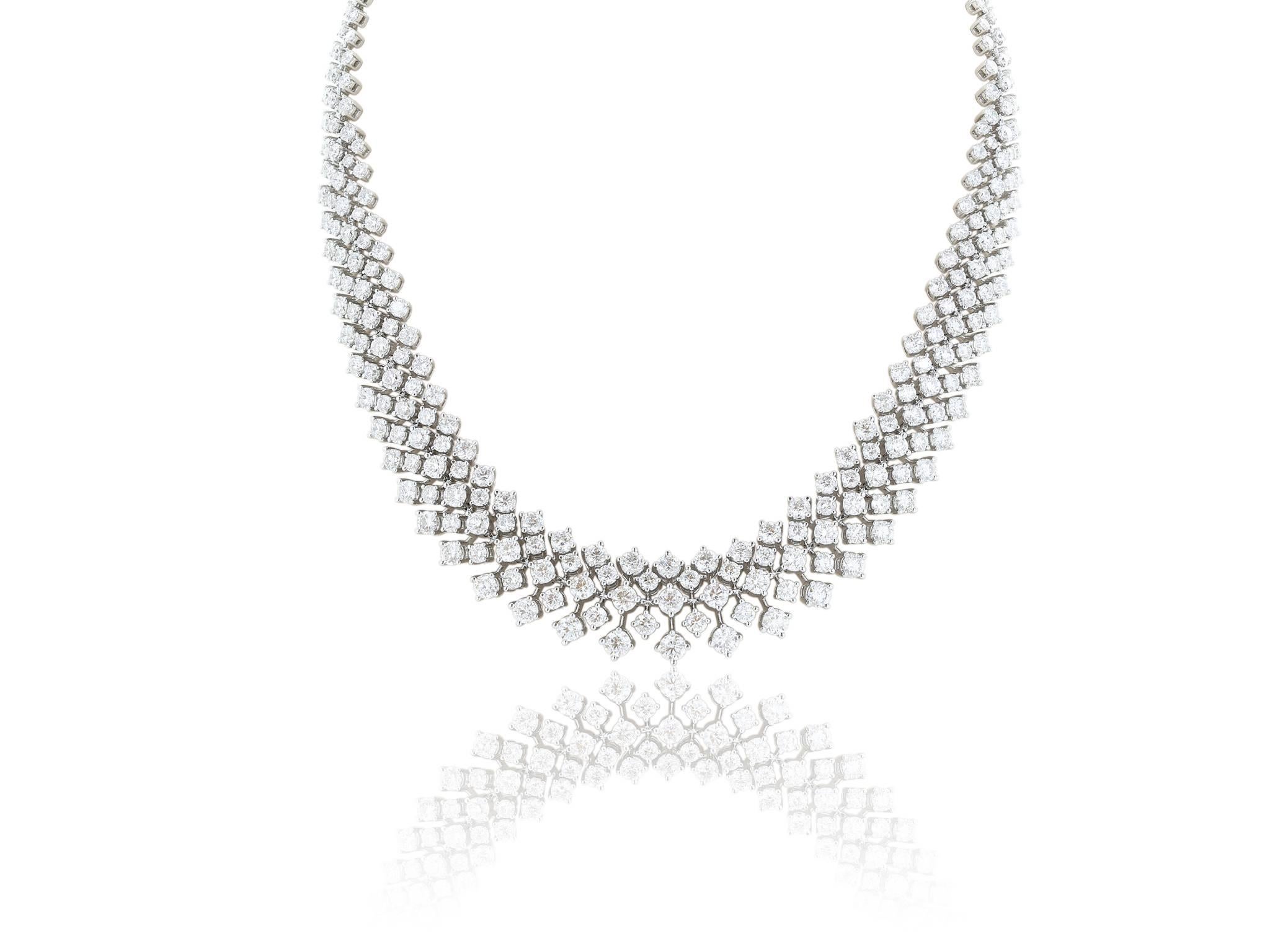 18 karat white gold ladies diamond Bib necklace, consisting of 30.50 carats tw of colorless F-G and eye clean VS2-SI1 clarity