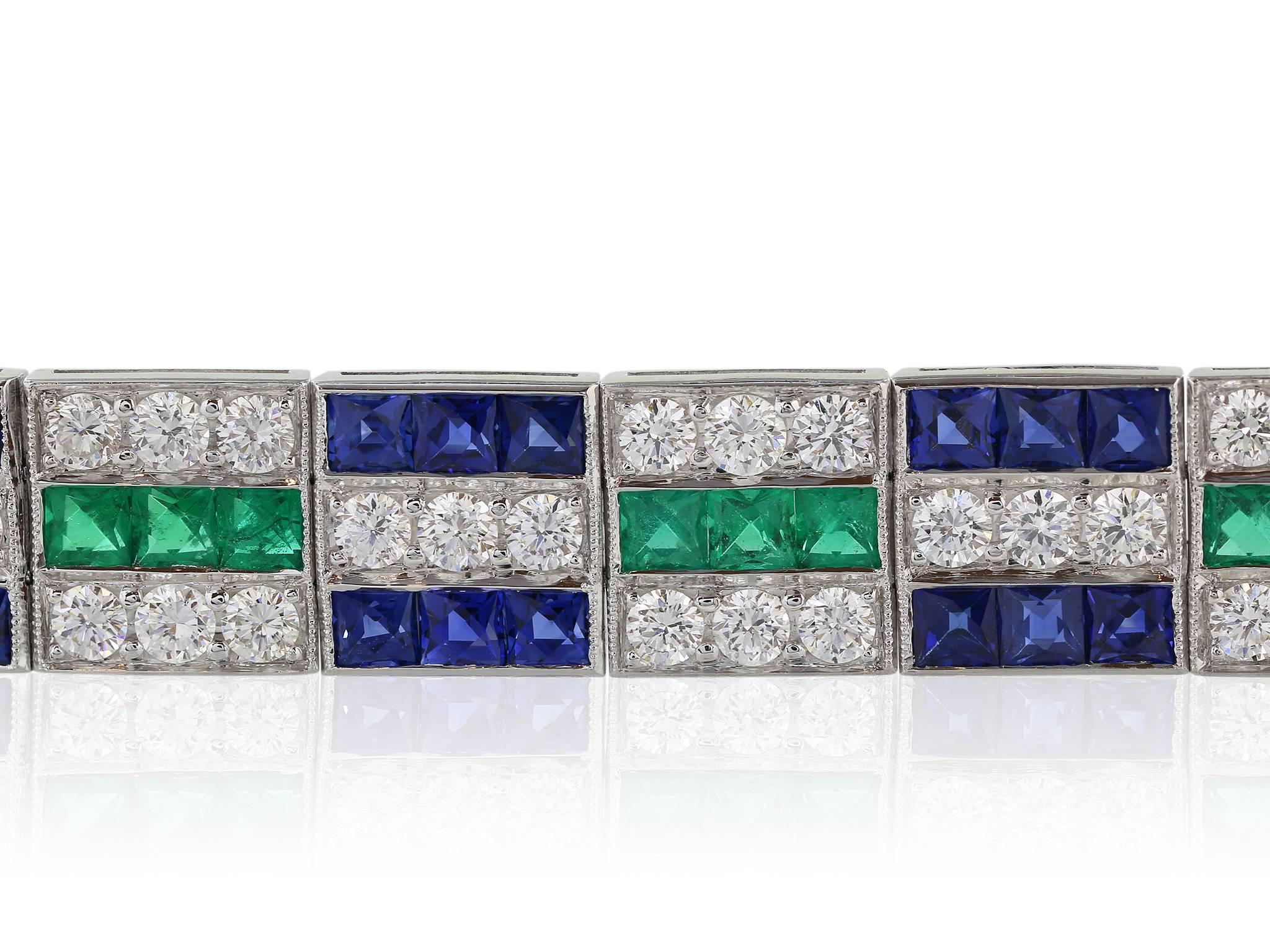 Platinum Art Deco style bracelet consisting of 60 sapphire having a total weight of 9.59 carats, 90 full cut diamonds having a total weight of 4.97 carats and 30 square cut emeralds having a total weight of 3.70 carats.
