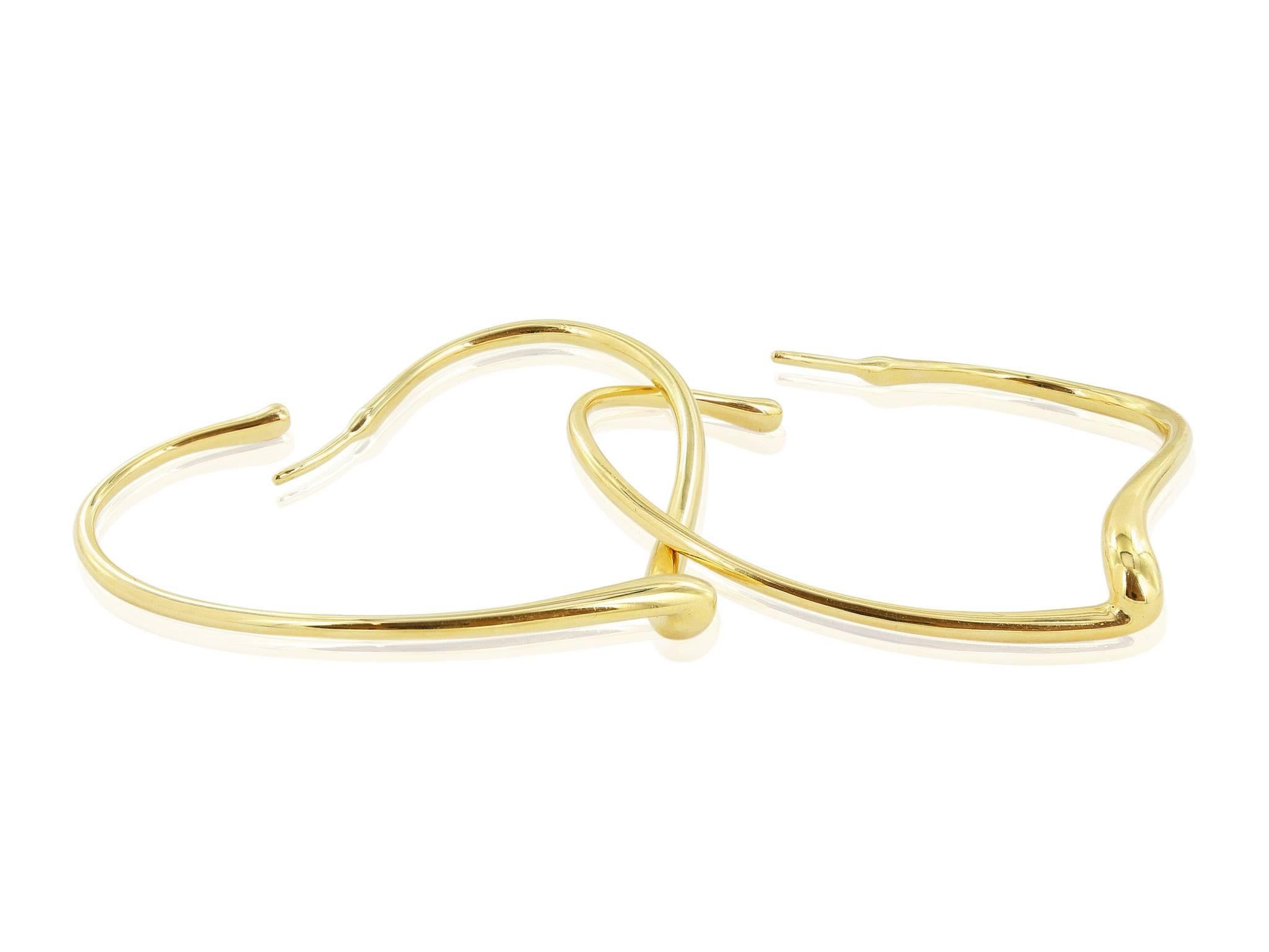 18 karat yellow gold heart shaped hoop earrings, signed Elsa Peretti Tiffany & Co.