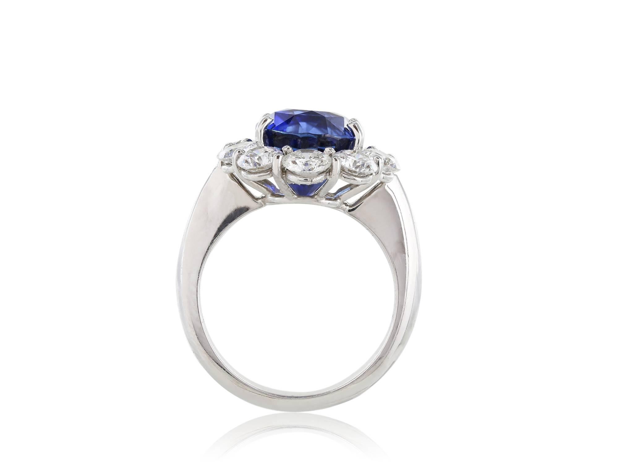 Oval Cut 7.05ct Ceylon Sapphire and Diamond Cluster Ring For Sale