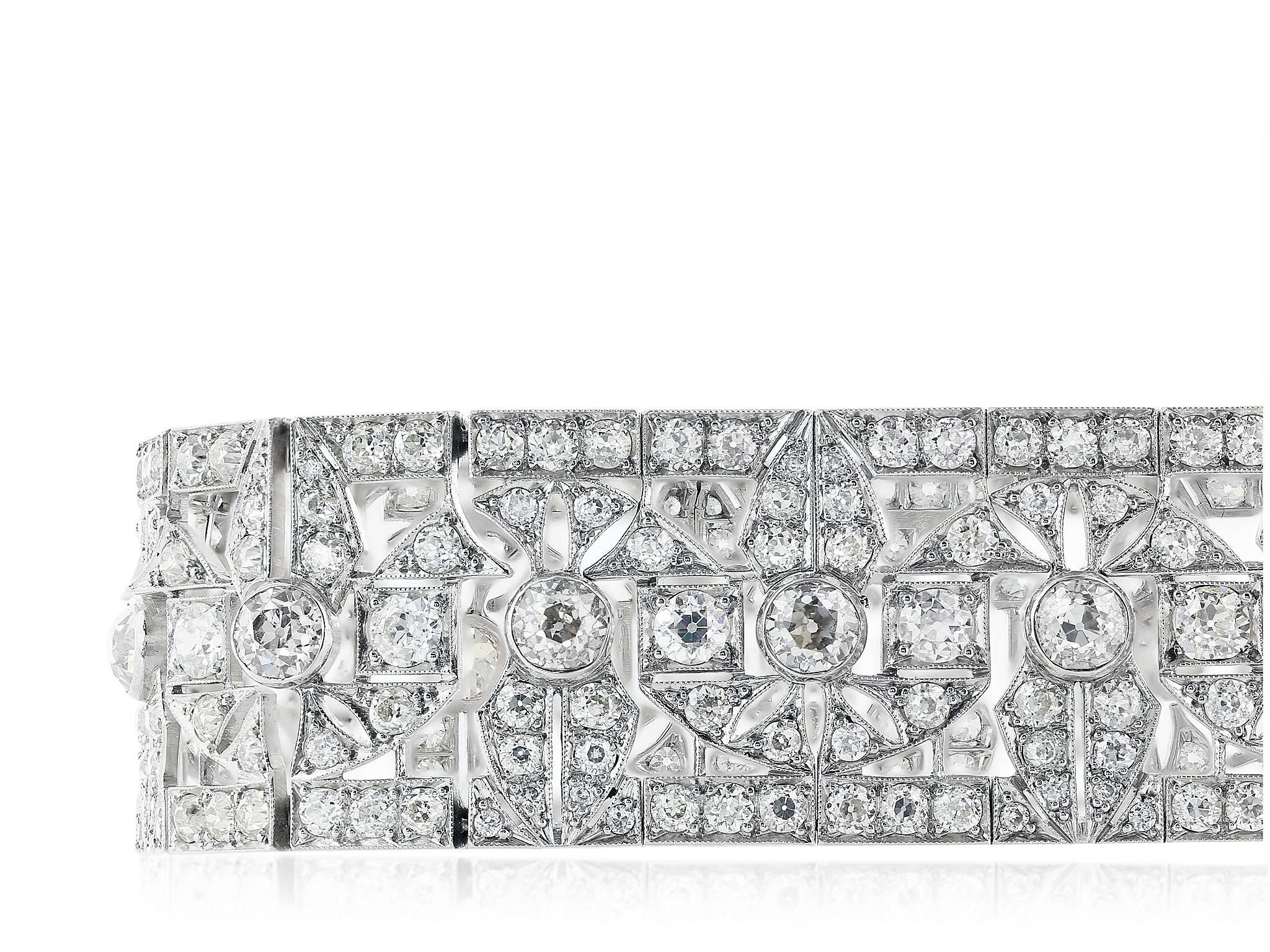 Platinum handmade Art Deco flexible bracelet consisting of approximately 250 Old European cut diamonds with an approximate weight of 20 carats with a color and clarity of F VS1 receptively,signed Black, Starr & Frost.