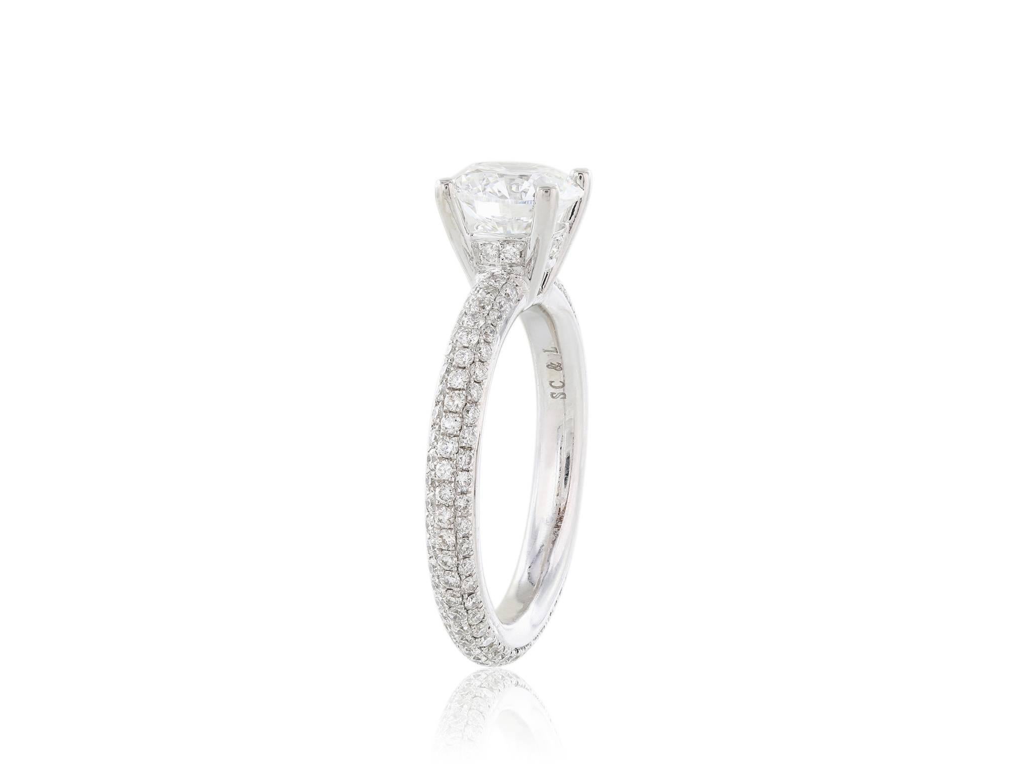 1.64 Round brilliant cut diamond ring with a color of F and a clarity of SI1.  The diamond is set in a micro pave eternity band with a total weight of .89 carats. GIA cert. 13344336 in a platinum mounting