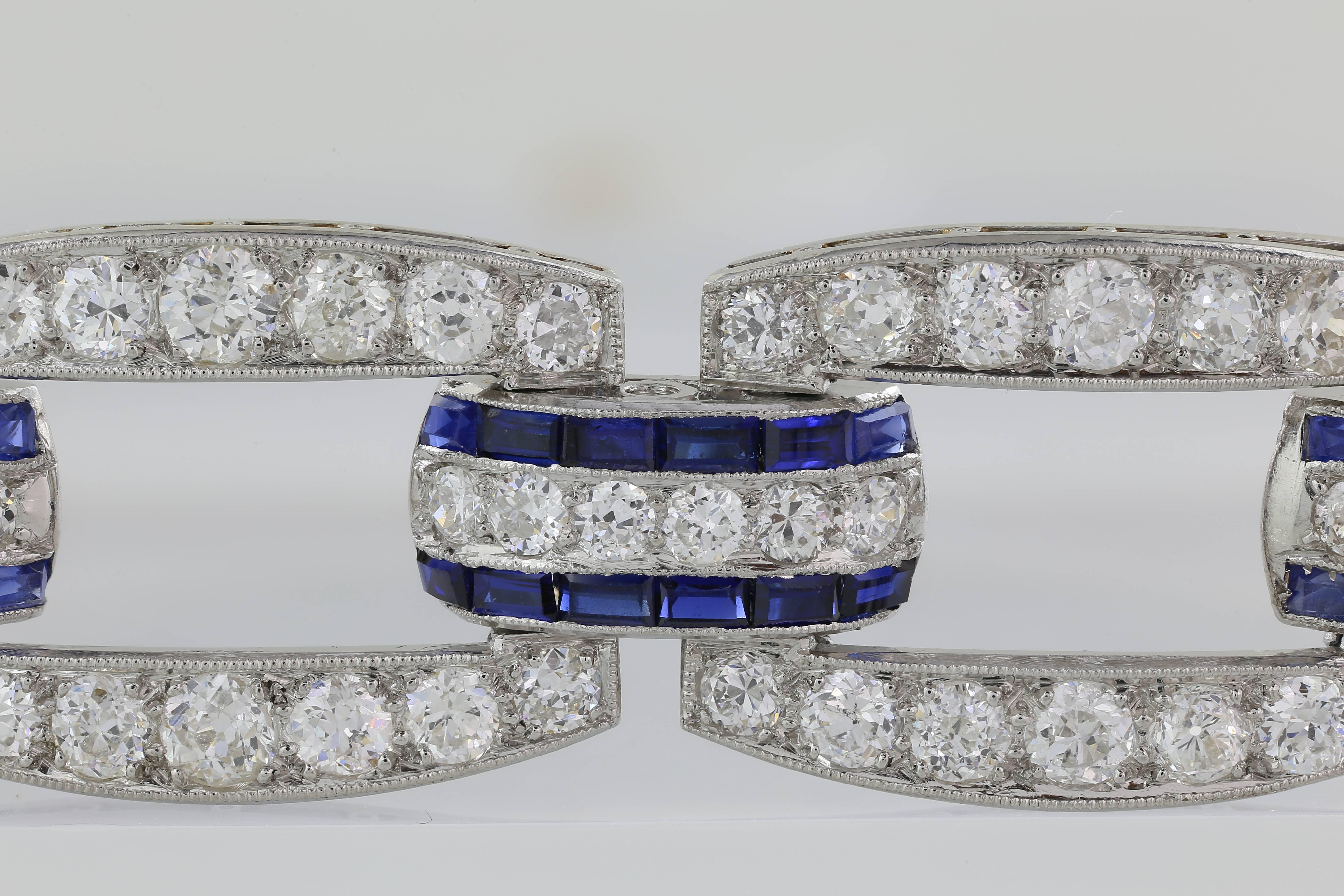 Platinum Art Deco Bracelet consisting of 160 old European cut diamonds having a total weight of approximately 12.50 carats set with 96 baguette cut sapphires having a total weight of approximately 3.00 carats, length is 7.5".