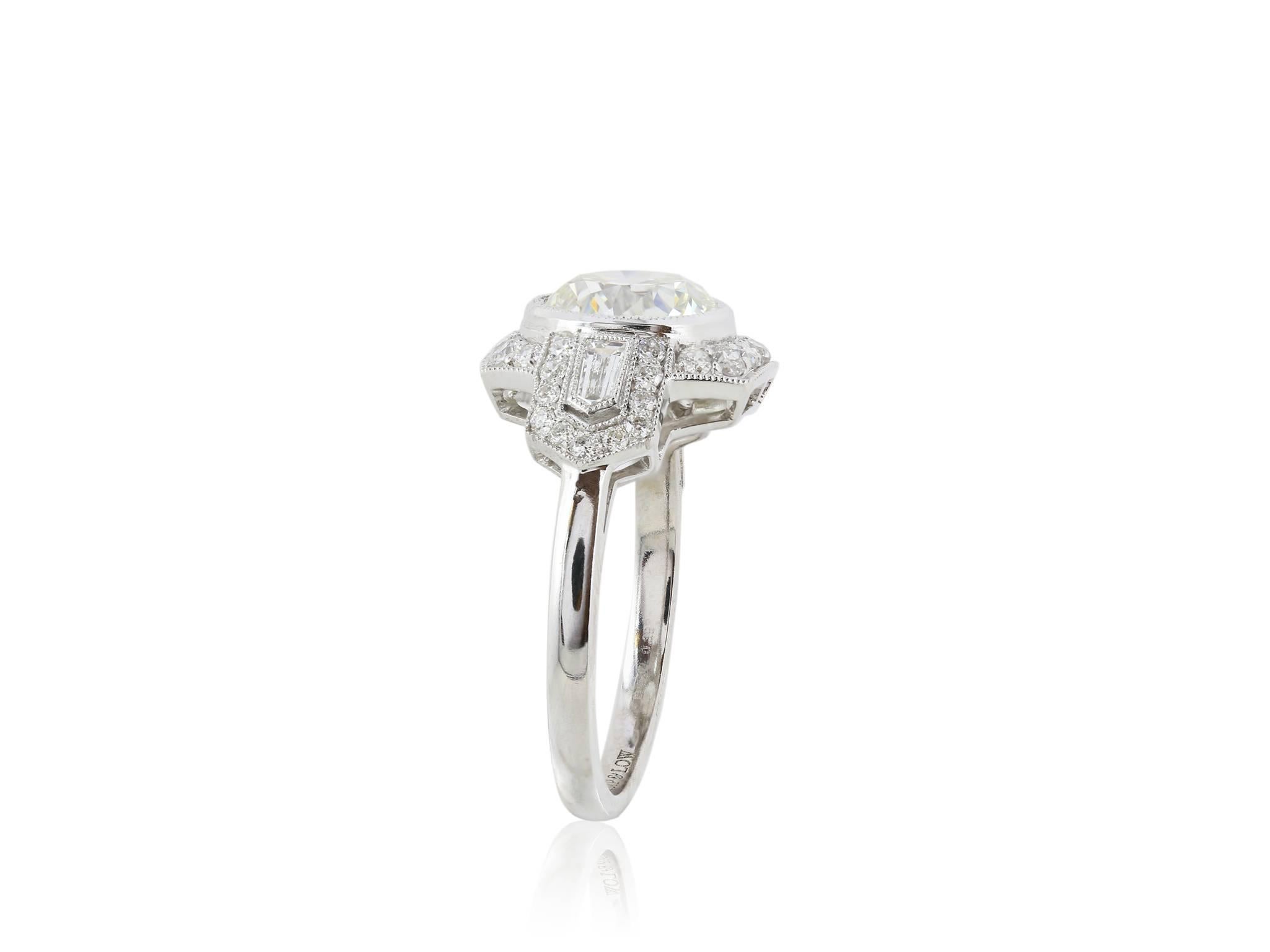Platinum antique style ring with an intricate setting featuring 1 Old European cut diamond I/VS2 GIA cert# 2175169778  the diamonds in the mounting total a weight of .53 carats. the ring is a size 6.6