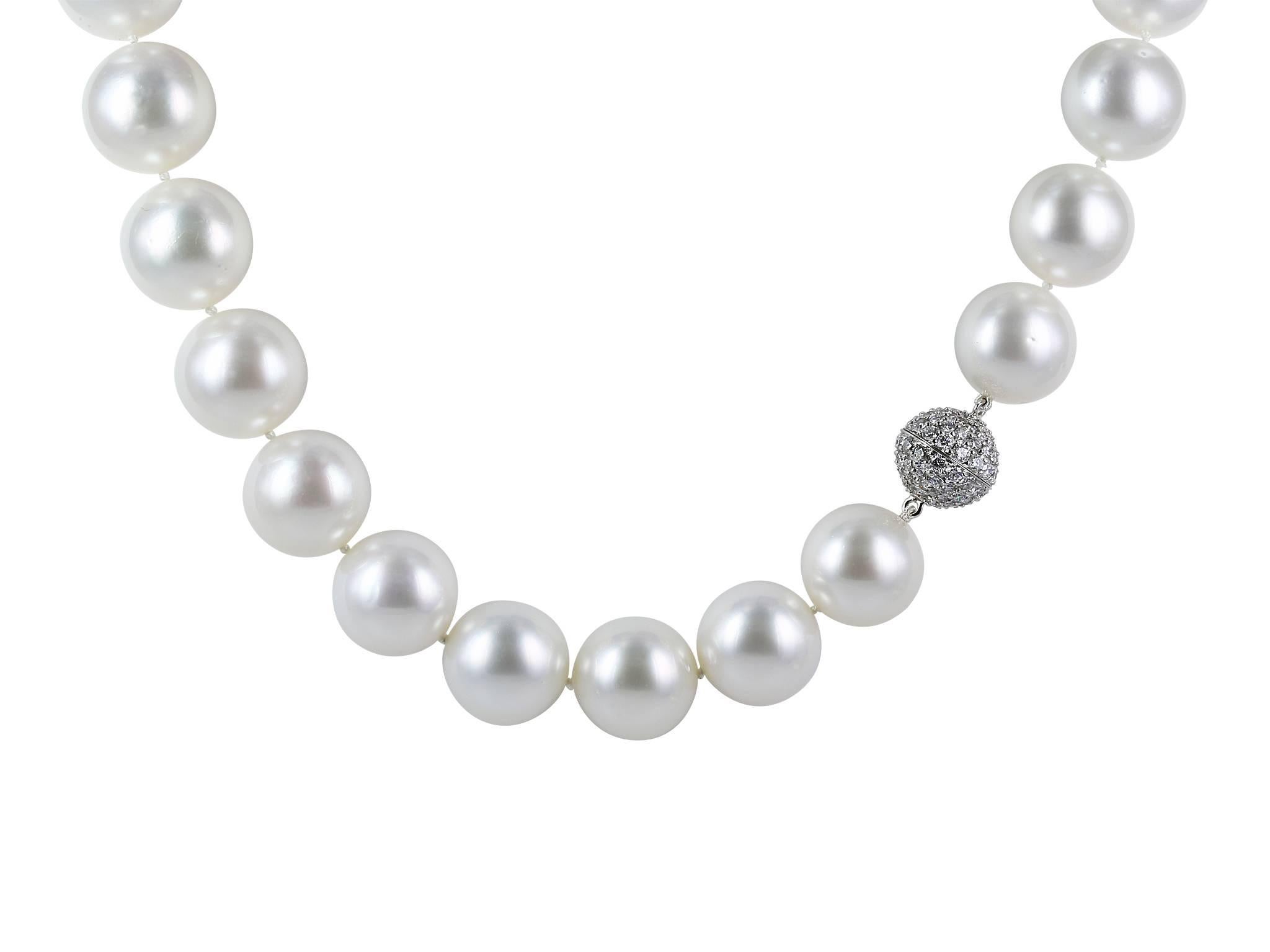 Nineteen inch pearl necklace consisting of twenty-seven 15-18 millimeter South Sea Pearls strung with an 18 karat white gold ball clasp set with approximately one carat of round brilliant cut white diamonds. 