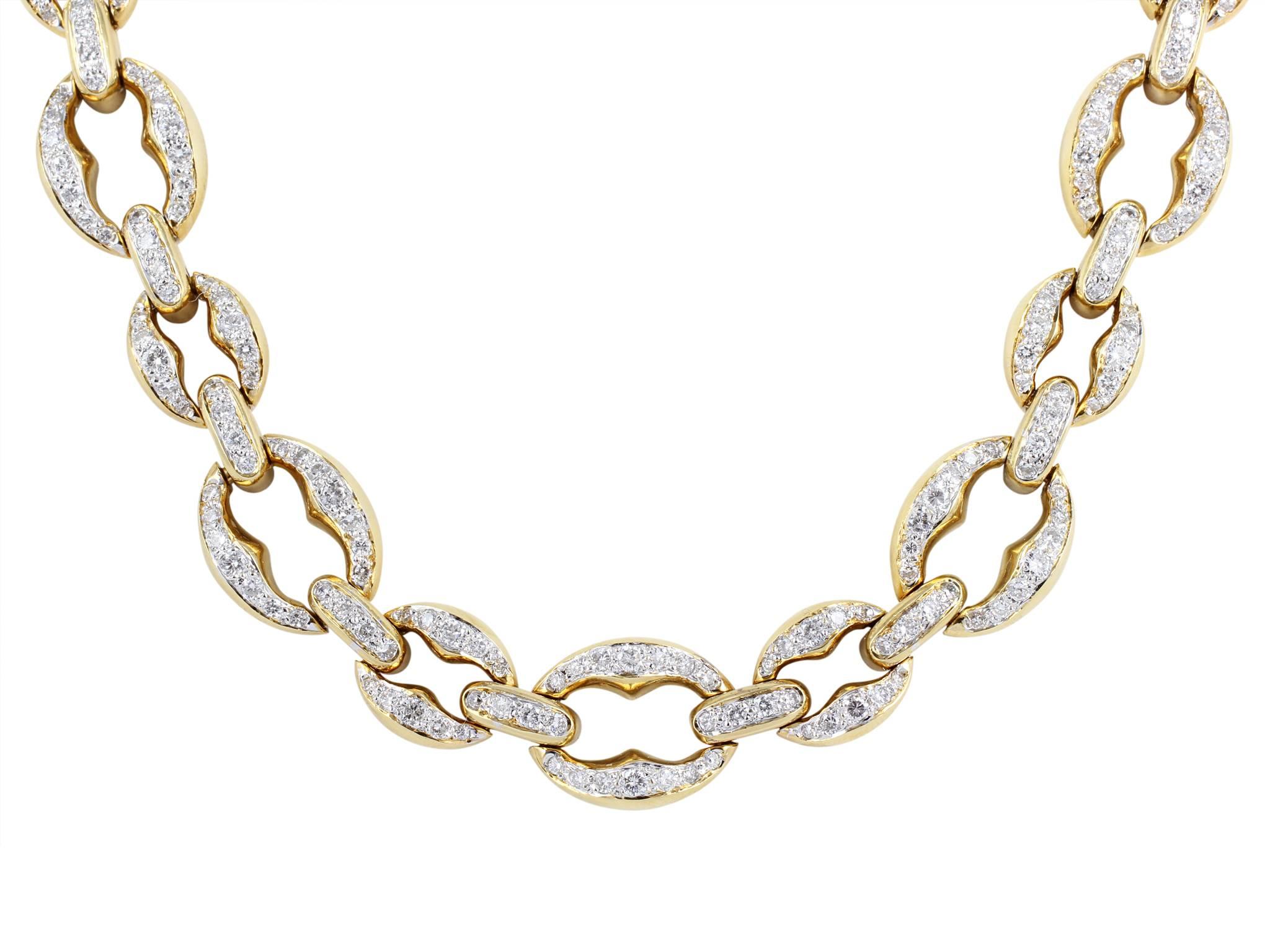 Estate 18 karat yellow gold link necklace consisting of 420 bead set round brilliant cut diamonds having an approximate total weight of 13.50 carats and weighing 69.9 dwt.