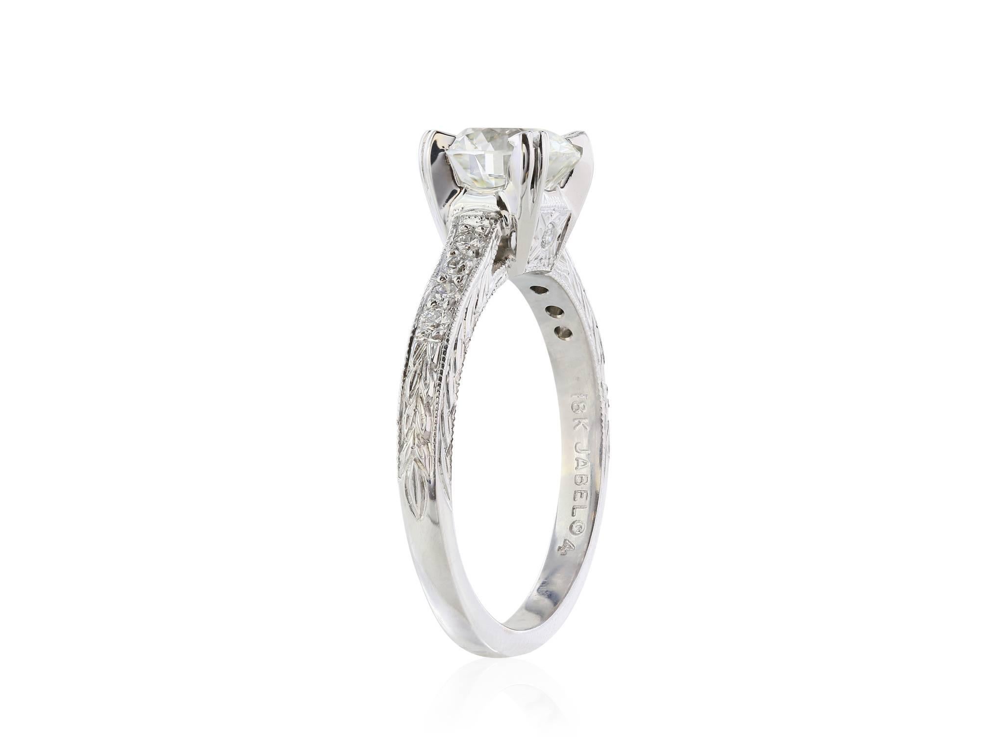 18 Karat white gold ring featuring one GIA certified # 2137323686 round brilliant cut diamond weighing 1.21 carats with a color of I, a clarity of VS2 and a triple excellence rating for excellent cut, polish and symmetry. The diamond is set in a