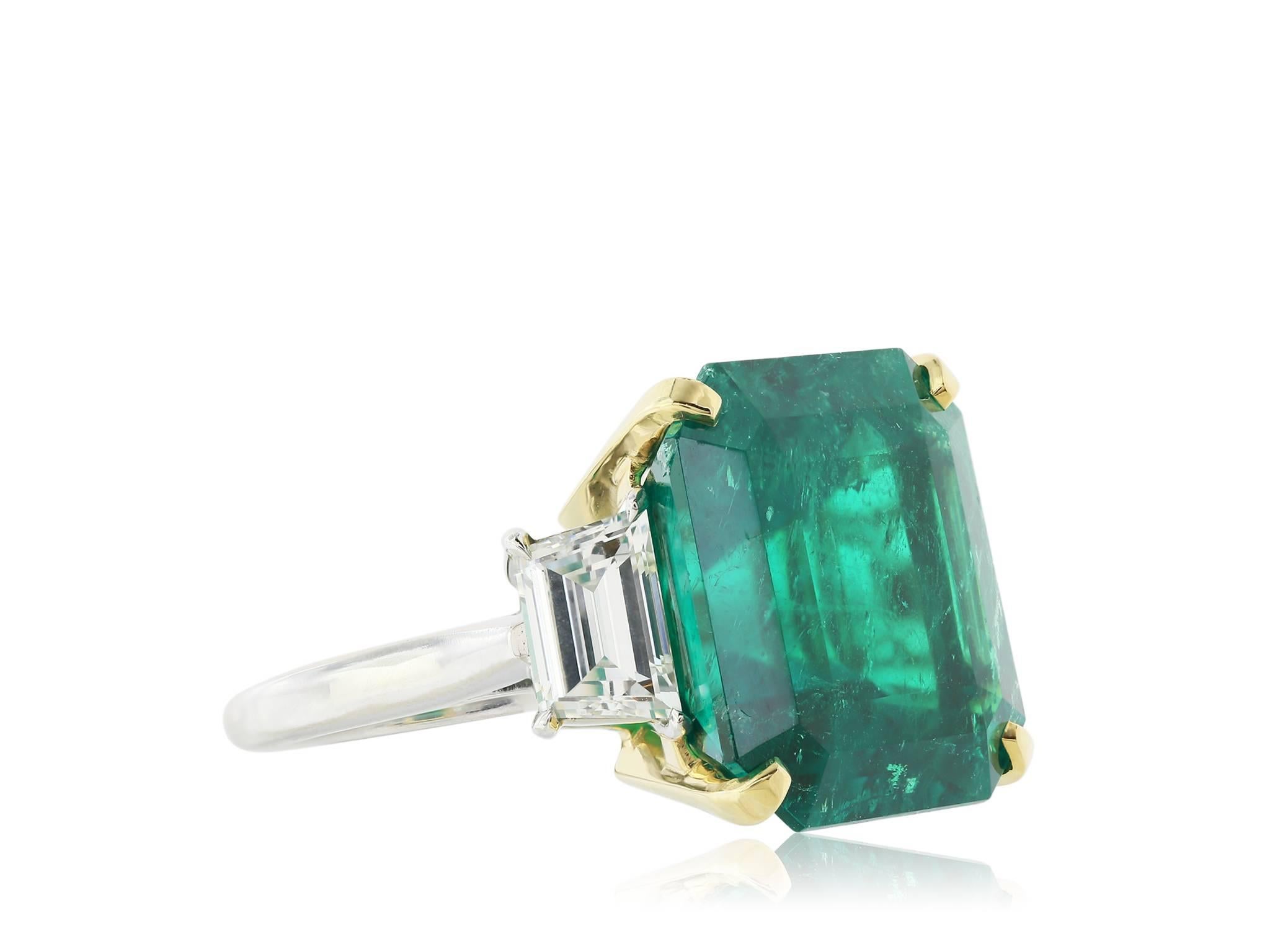 Shreve, Crump & Low''s custom made 18 karat yellow gold and platinum custom made Fine Colombian Emerald and diamond three stone engagement ring. Consisting of one square cut Emerald weighing 16.11 carats AGL #1084849 Colombian Minor oil and diamond