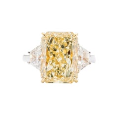 GIA Certified 7.95 Carat Radiant Cut Fancy Yellow Diamond Three-Stone Engagement