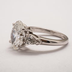 GIA Certified 3.20 Carat D/SI1 Oval Three-Stone Diamond Engagement Ring