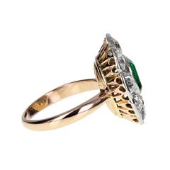 Antique Oval Emerald and Diamond Cluster Ring in Gold