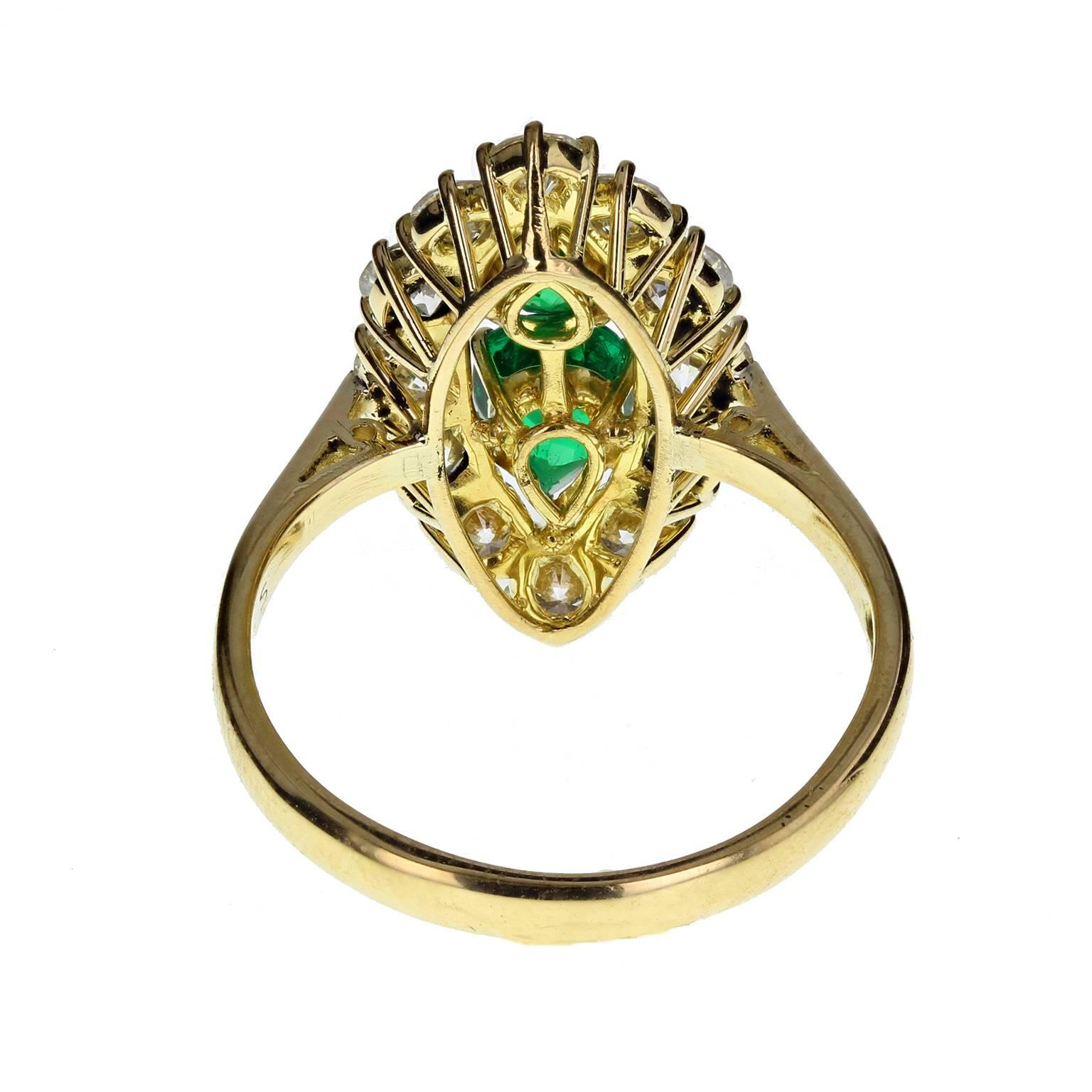 Fine Quality Marquise Shaped Emerald Diamond Gold Cluster Ring In New Condition In Newcastle Upon Tyne, GB