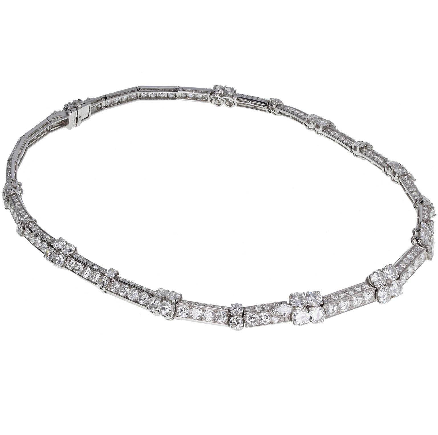An exquisite quality 1930s necklace by Cartier Paris. Brilliant-cut diamonds arranged in groups of four and two, set between pavé set diamond bars. Diamond set clasp with marquise-cut diamonds. High quality and well matched diamonds, as would be