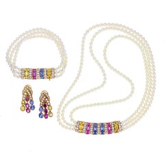 Van Cleef & Arpels Pearl Sapphire Ruby Gold Necklace Bracelet and Earrings
