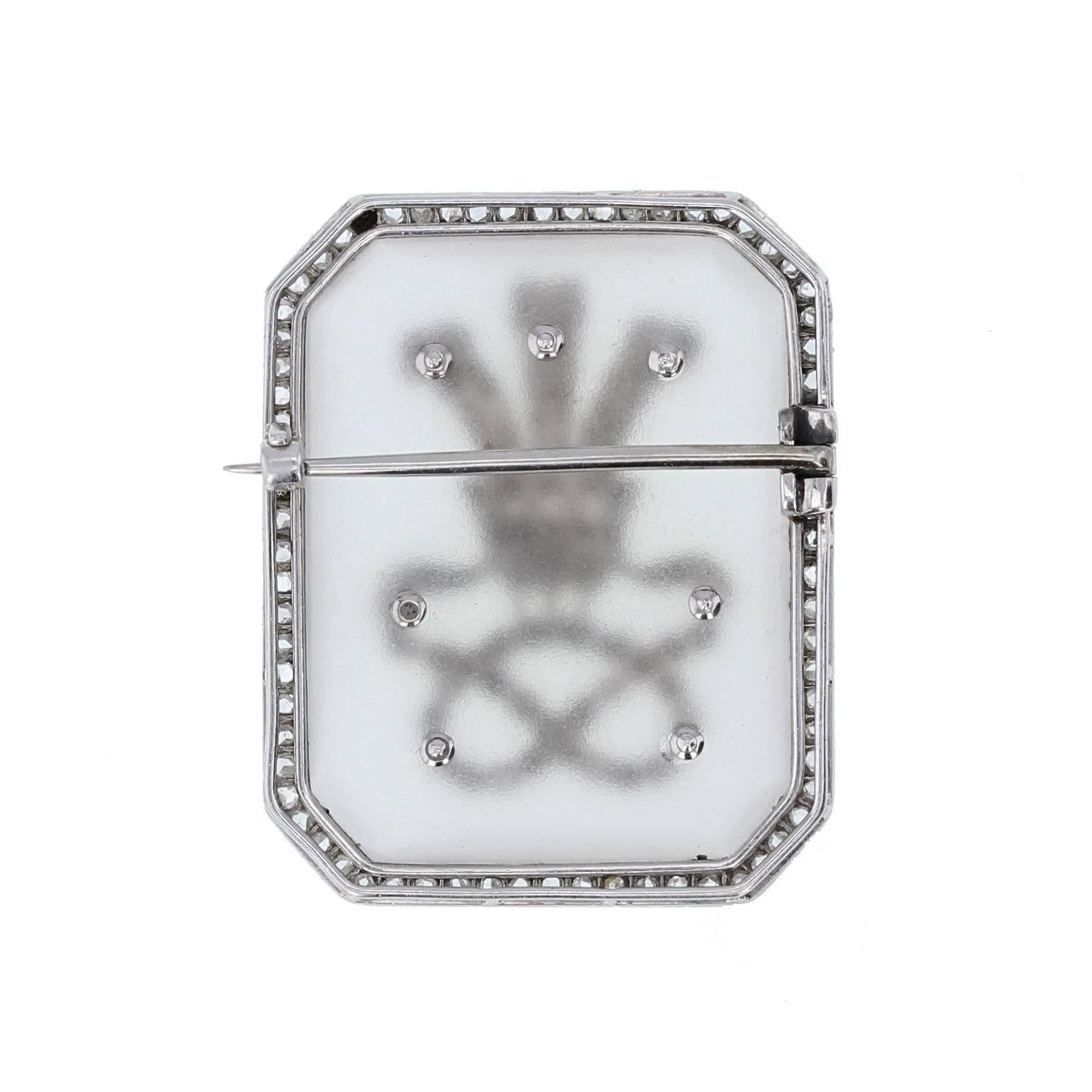  fine and impressive antique brooch. Fashioned from a rectangular piece of rock crystal, set in a border of rose-cut diamonds. A central emblem of ostrich feathers in a coronet adorned with further rose-cut diamonds. In excellent condition.
