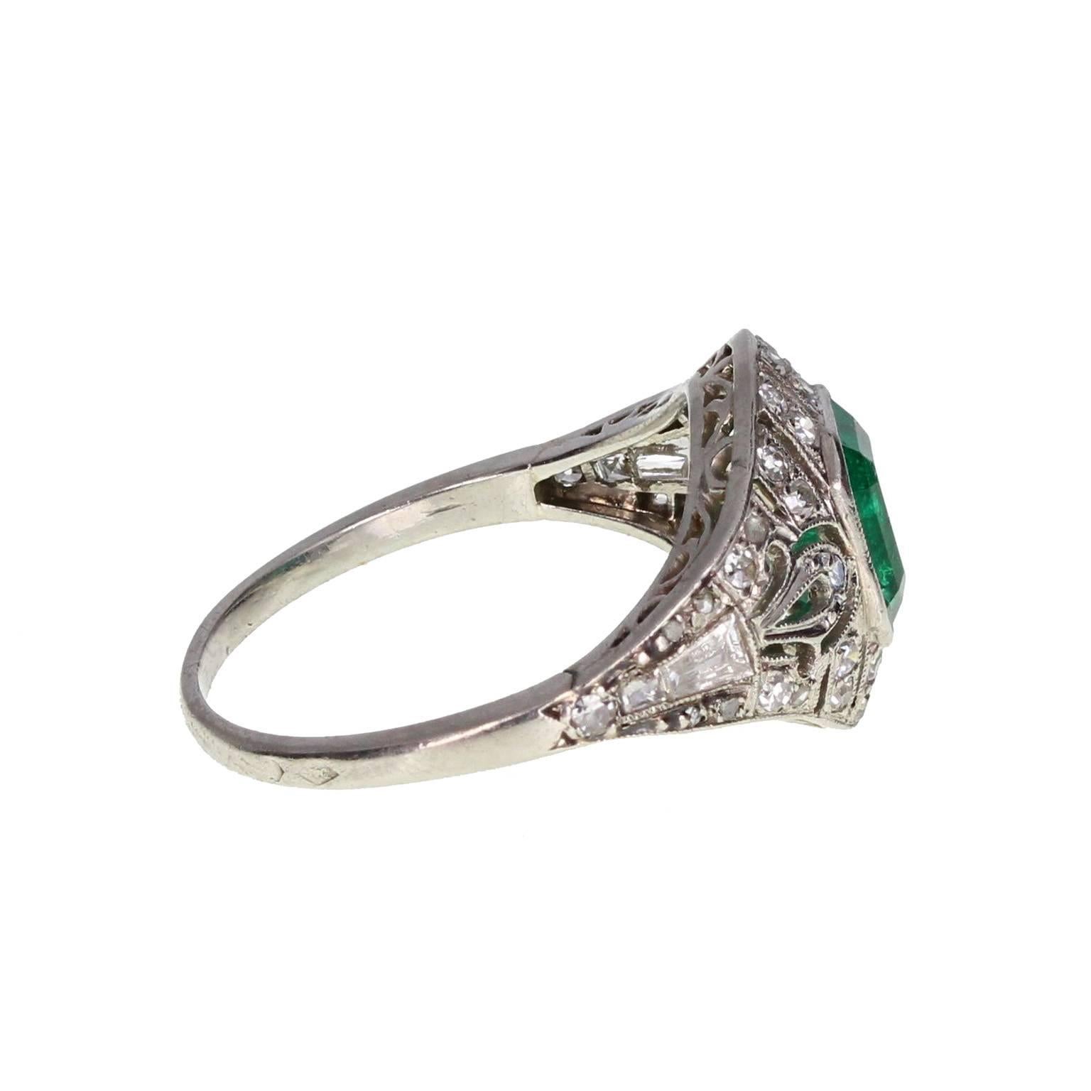 Art Deco Emerald Diamond Platinum Cluster Ring In Excellent Condition In Newcastle Upon Tyne, GB