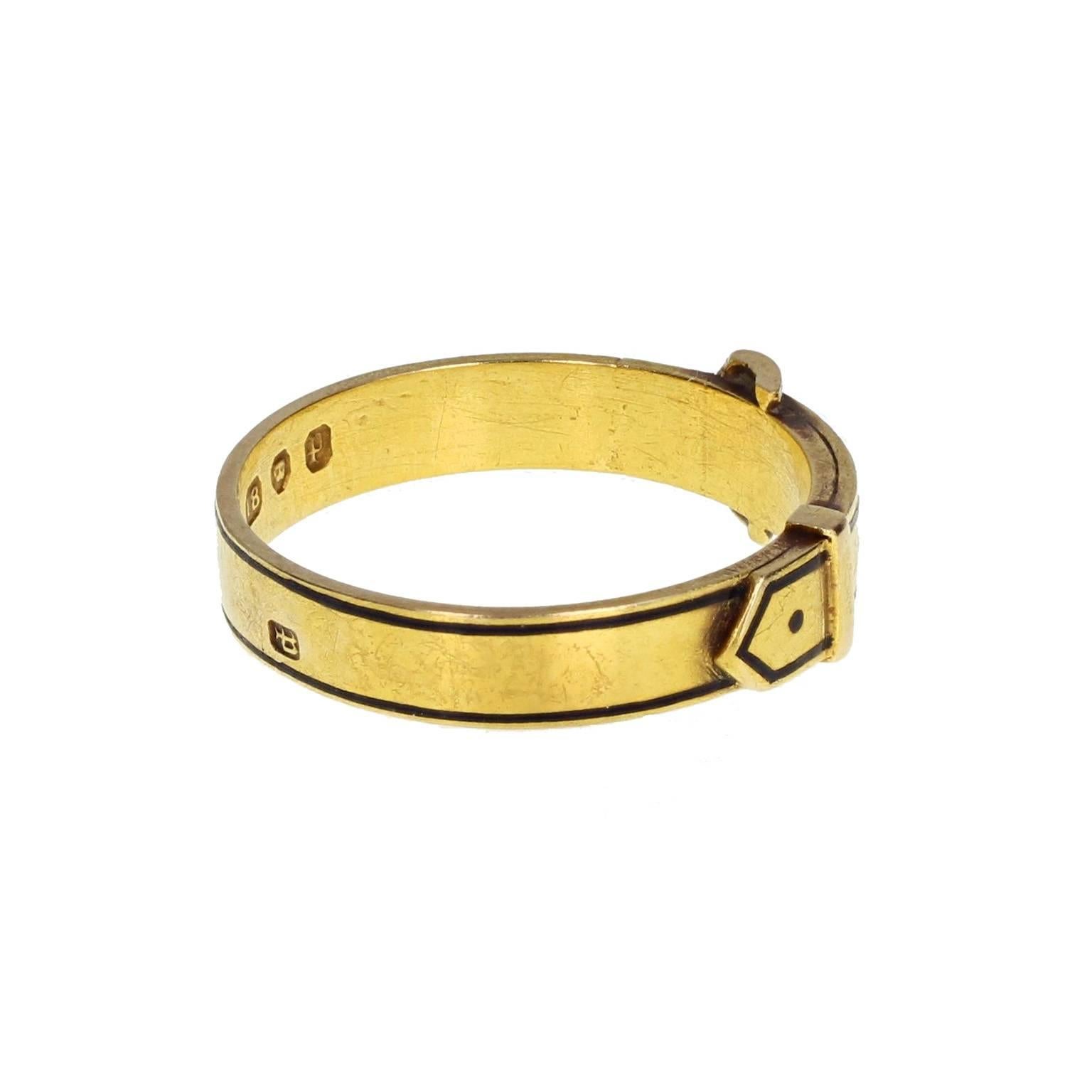 Dated 1870, this exquisite quality gold and black enamel buckle ring is from the height of the mourning jewellery trend. Following the death of Queen Victoria's beloved husband, Prince Albert in December 1861, mourning jewellery became highly