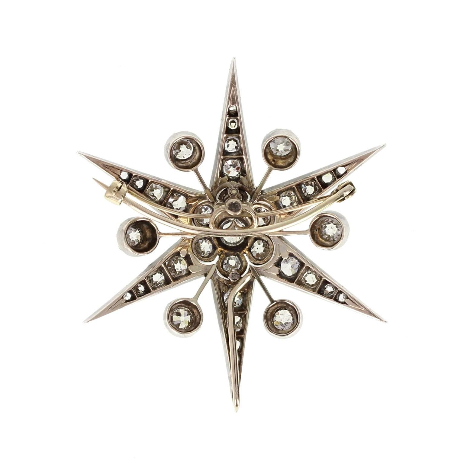 From the height of the Victorian era, with fittings to the rear to wear as either a brooch or a pendant, this six pointed star is formed elegantly from 18 carat gold and silver. Mounted with old mine-cut and rose-cut diamonds graduating in size down