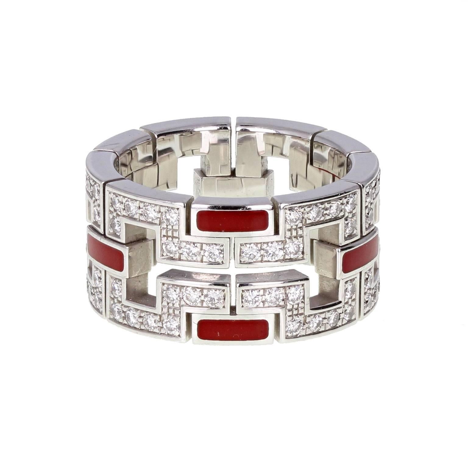 A rare and fine quality diamond set band ring by Cartier from the Baiser du Dragon collection. A 10.5mm wide 18 carat white gold band in the typical Far East style of the Baiser du Dragon Cartier pieces. Pierced and pavé set with brilliant-cut