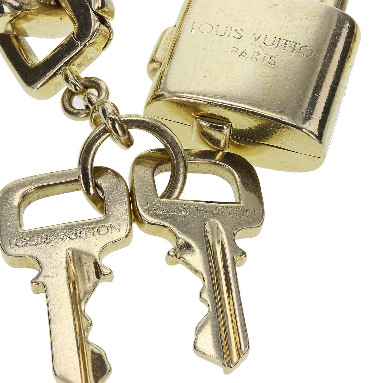 Louis Vuitton Paris Heavy Gold Padlock and Key Bracelet at 1stdibs