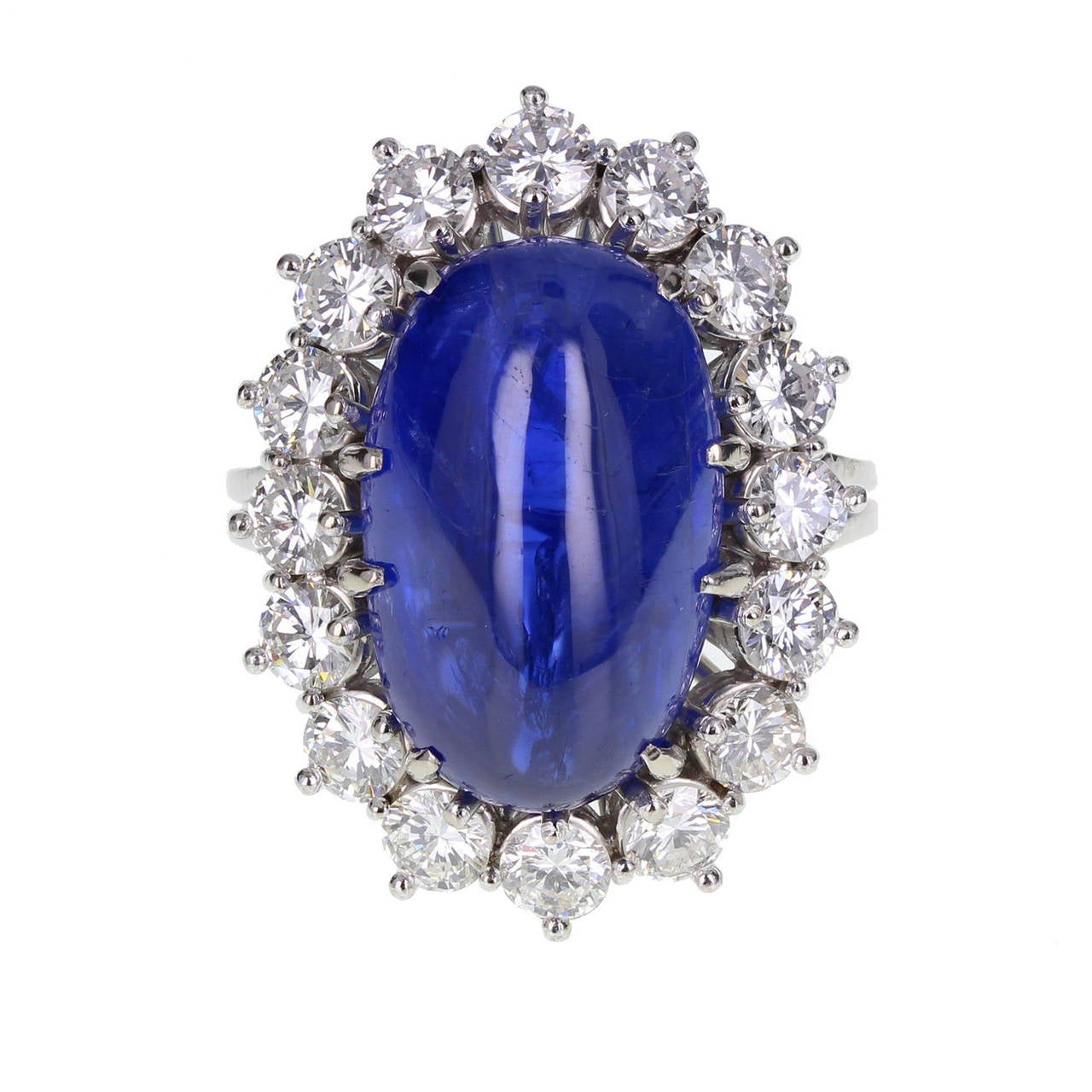 Oval Cabochon 13.71 Carat Sapphire Diamond Cluster Ring For Sale at 1stdibs