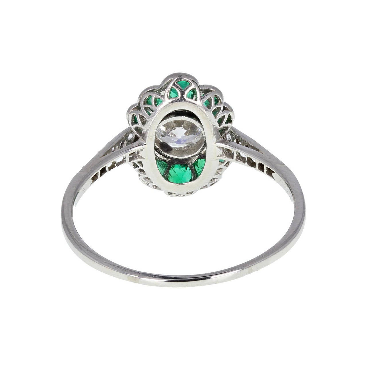 Art Deco 1930s Emerald and Diamond Cluster Ring in Platinum For Sale