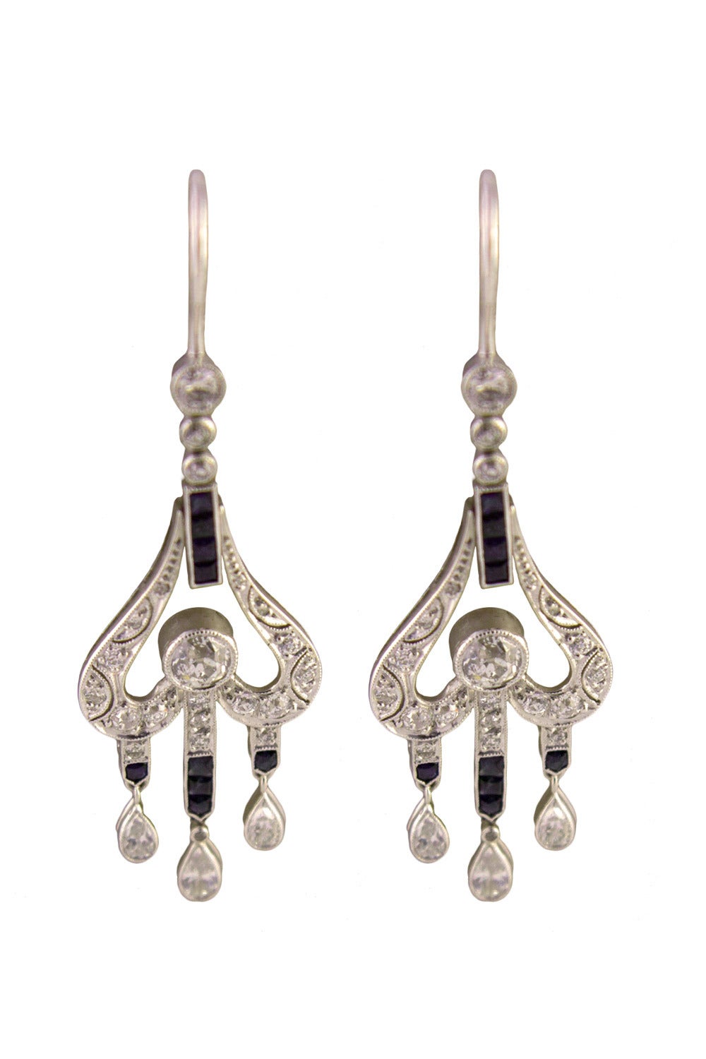 Belle Epoque chandelier earrings, oriental style, with blue sapphires, OBC diamonds and three small pear shaped diamonds on each earring.
Total sapphires and diamonds approx. 5 ct, Platinum