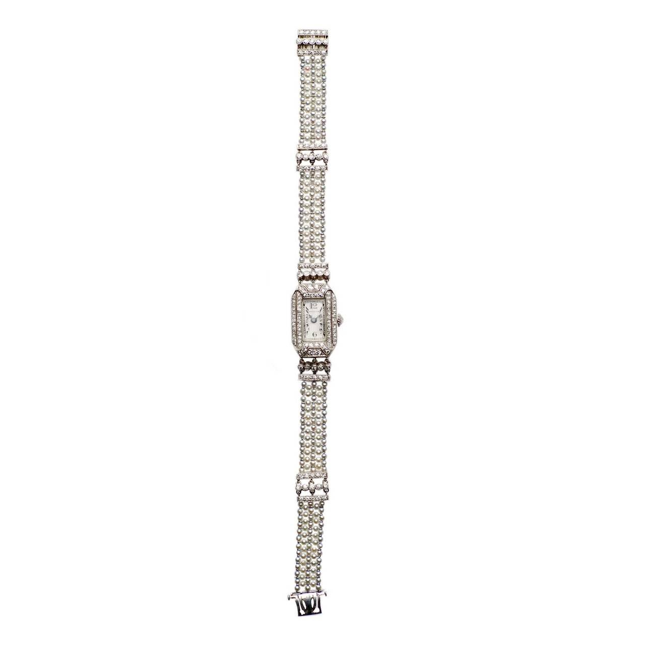 Marcus & Co., Belle époque Watch set in Platinum with Natural Pearls and diamonds.