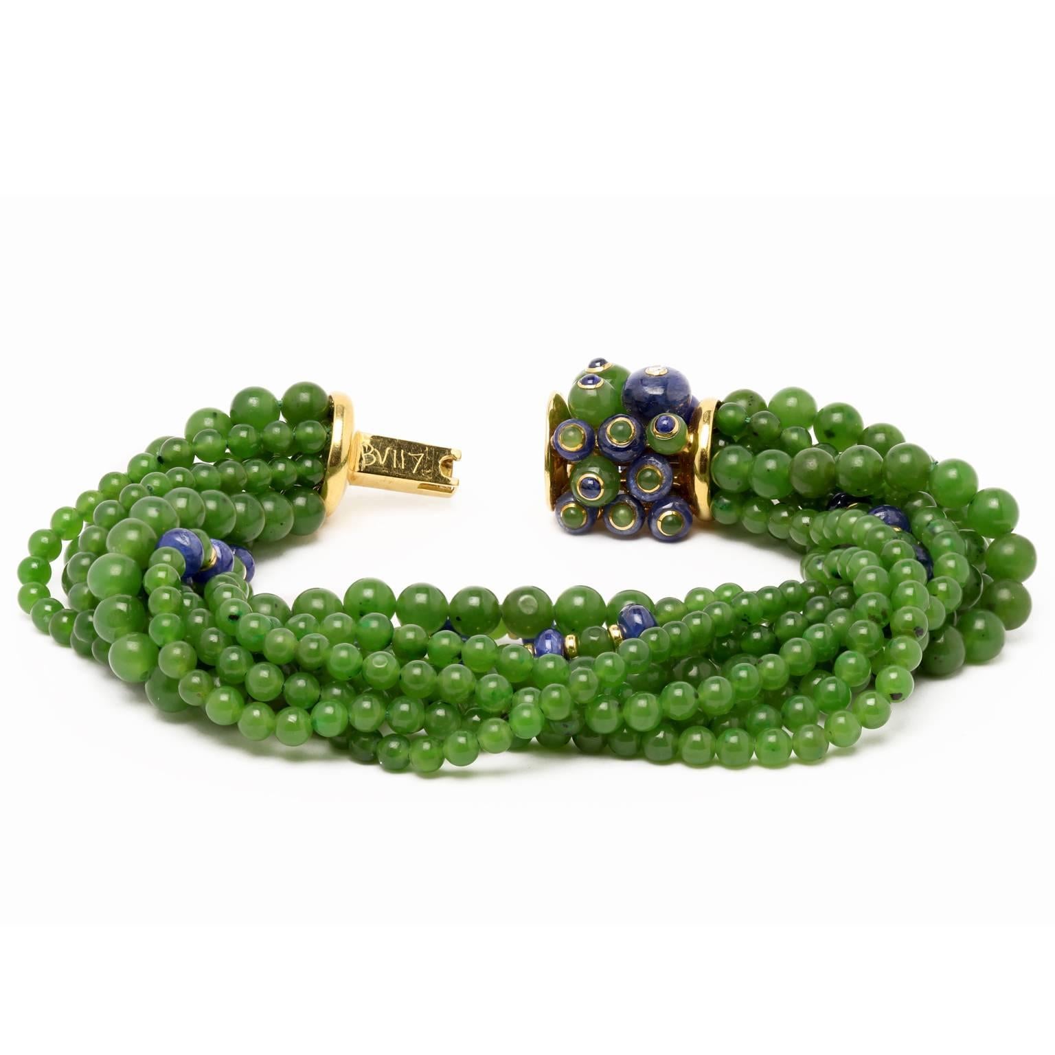 Trianon Jade Bracelet

18K yellow gold
Nine 8.25mm strands of 4mm jade beads 
Eighteen 3.5mm sapphire beads (approximately 41cts)

20mm box clasp with 17 sapphire and jade beads