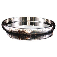 Pulsera tipo brazalete con bisagra de Brighton Venezia, en tono plateado, con motivos en espiral grabados y firmada