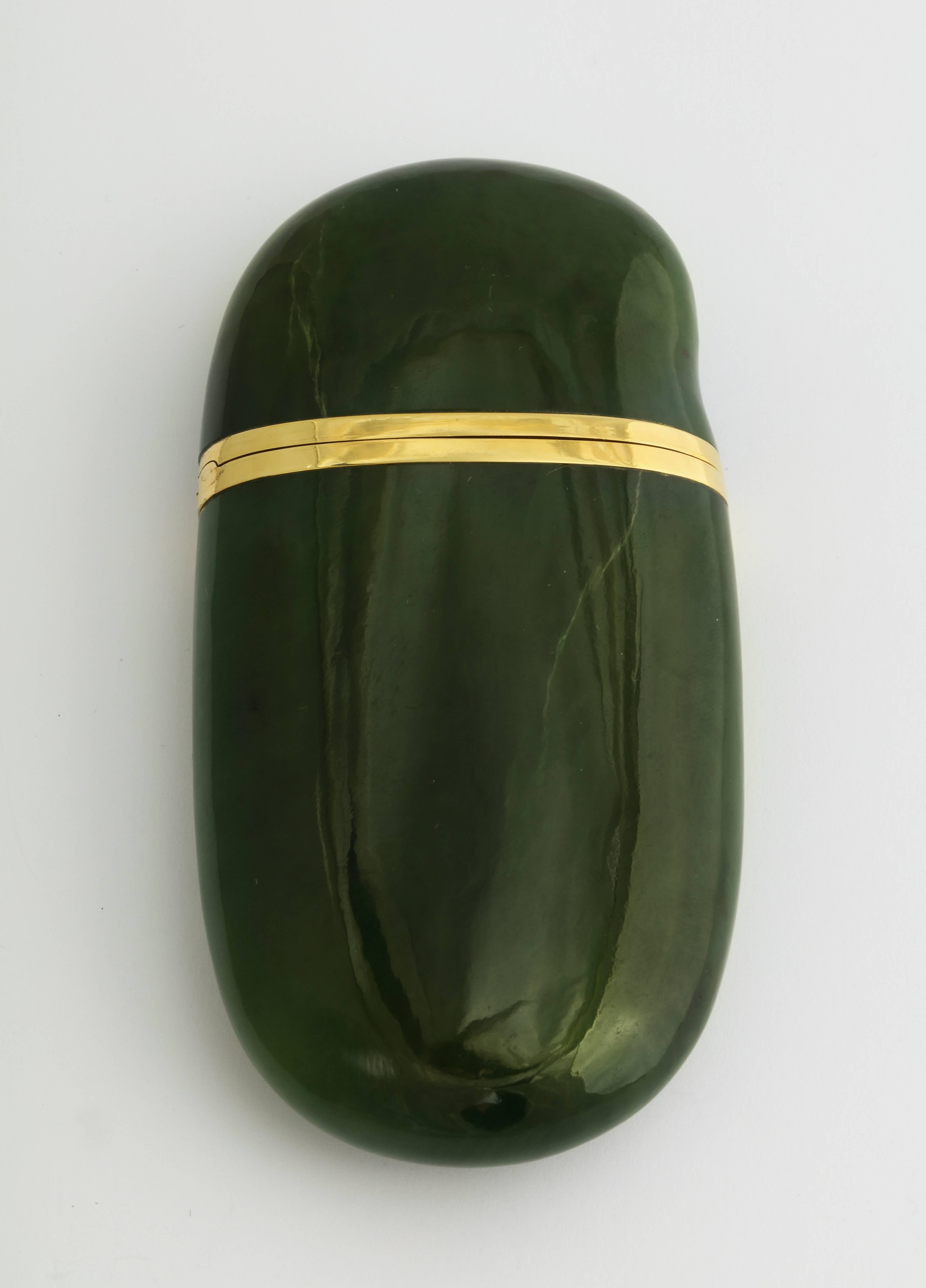 Recently sourced from a New York socialite, this hand carved jade and gold mounted evening bag is one of few ever made (3 in black and 3 in green), and is possibly the last to survive. Designed by Elsa Perretti for the 1976 Tiffany catalog, this