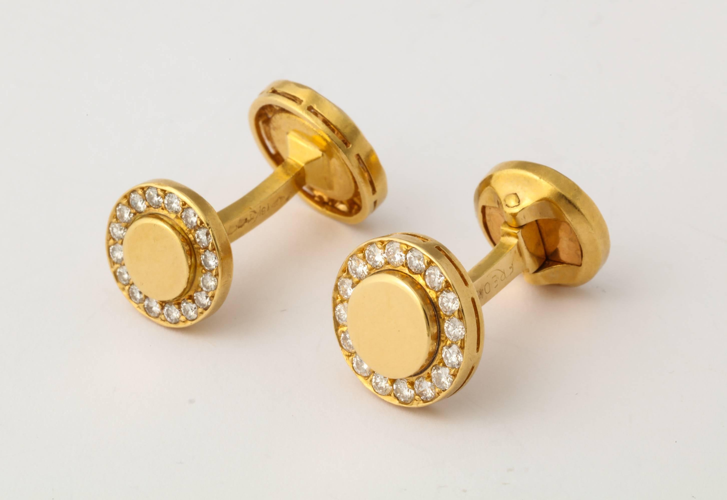Handsome and simply elegant 18K gold and diamond cufflinks from Fred-Paris. 1/2 in diameter. Multiple gold and maker marks.