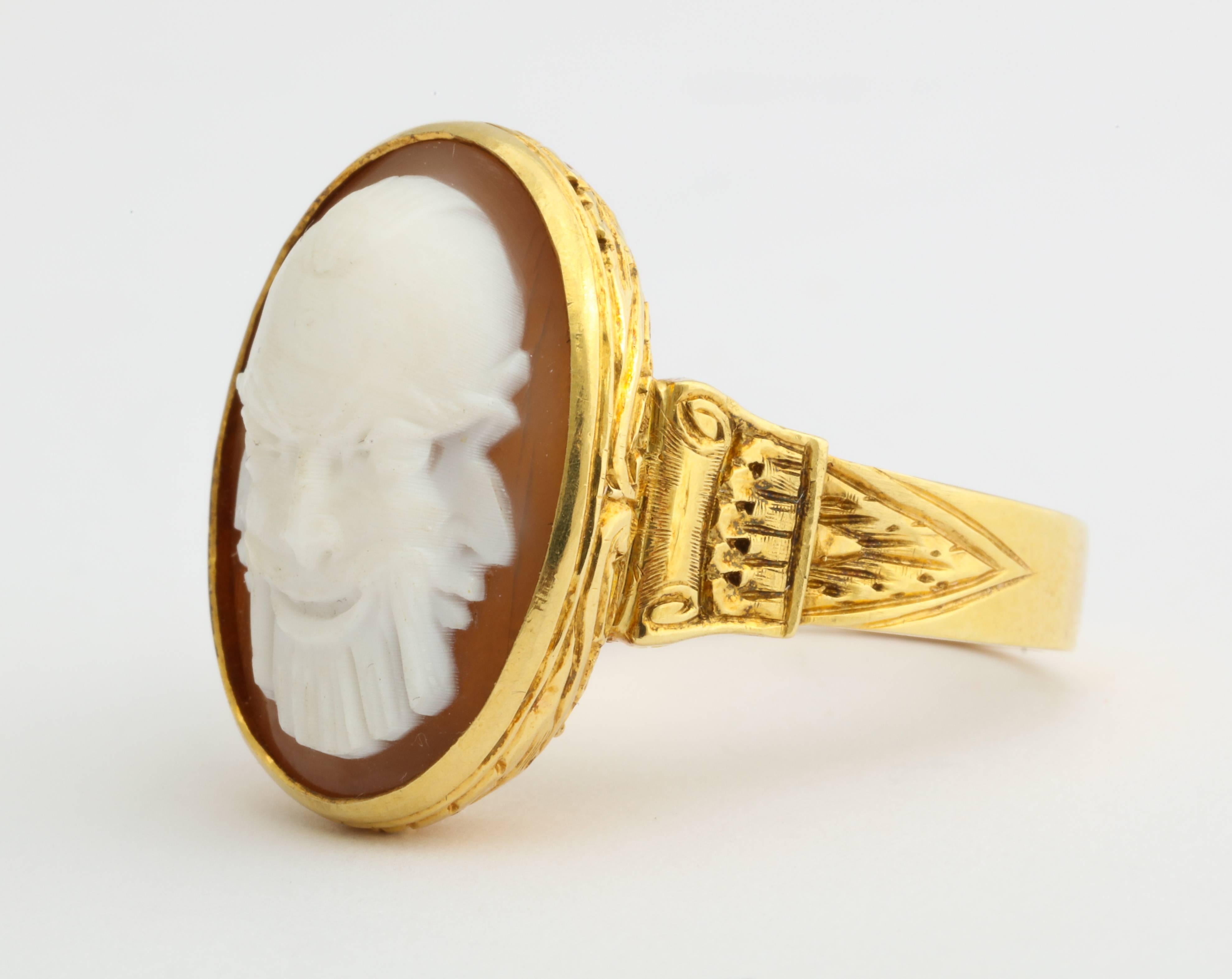Handsome and impressive scale, this unusual 18K man's ring features a finely carved cameo in the Classical Greek manner. Fits a size 11 3/4 to 12 finger. Gold mark.