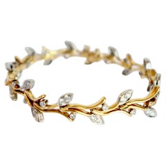 Tiffany & Co. Bracelet en forme de brindille en or jaune 18 carats, platine et diamants