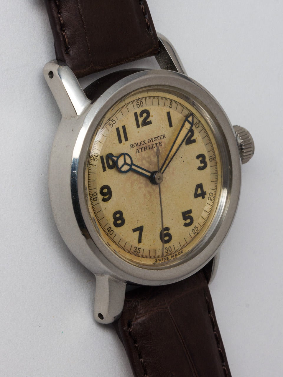Rolex Stainless Steel Oyster Athlete Wristwatch, Ref 4127, serial number 215,XXX, circa 1943. 32 x 40mm Oyster case with wide rounded bezel and early Oyster Patent crown. Beautiful original silvered dial with nicely patinaed luminous indexes and