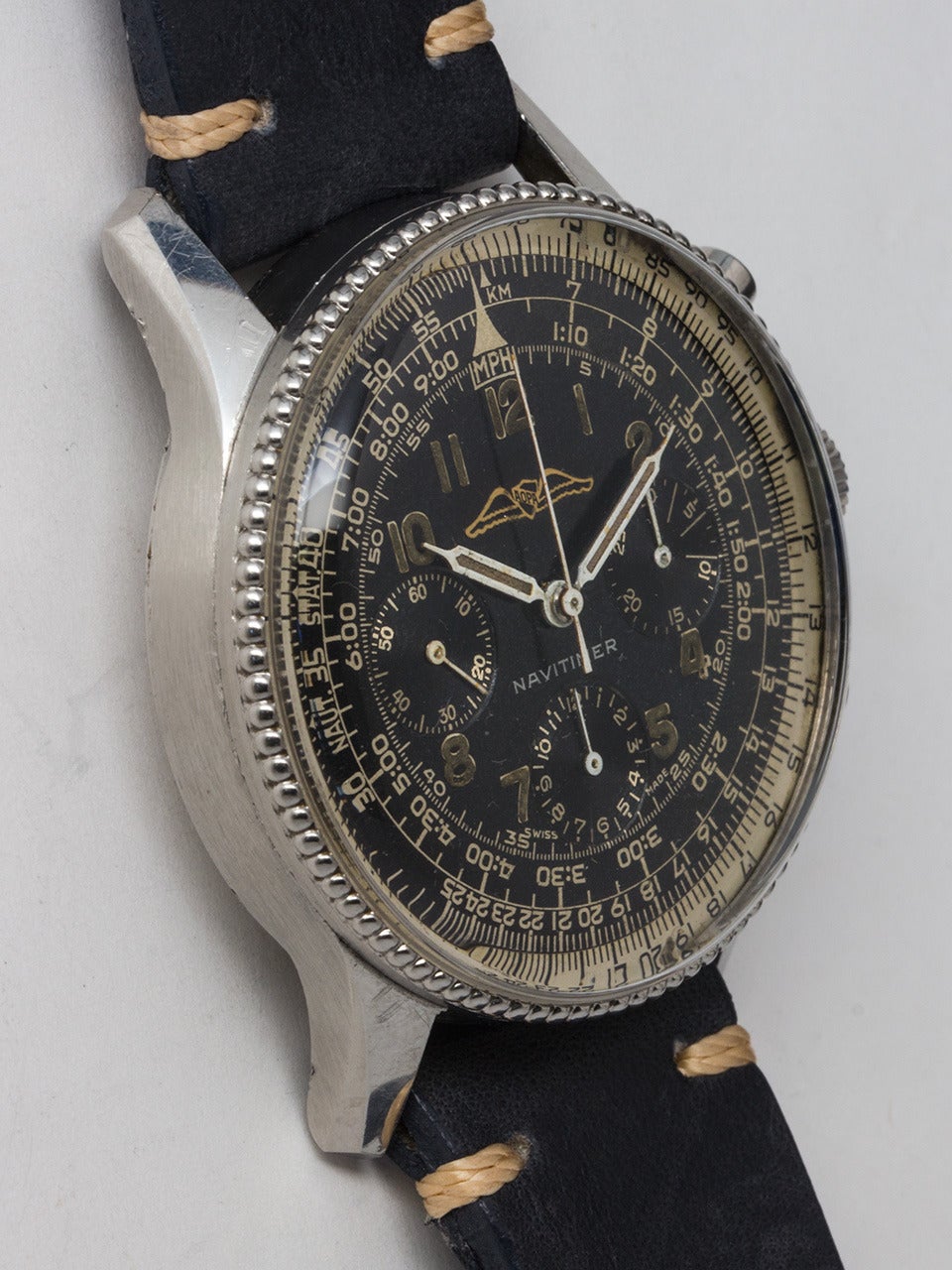 Breitling Stainless Steel Early Navitimer Aviator's Chronograph Wristwatch, Ref. 806, circa 1960s. 40 x 47mm case with acrylic crystal and signed crown. Featuring characteristics that are unique to this early model including a fine beaded bezel, all