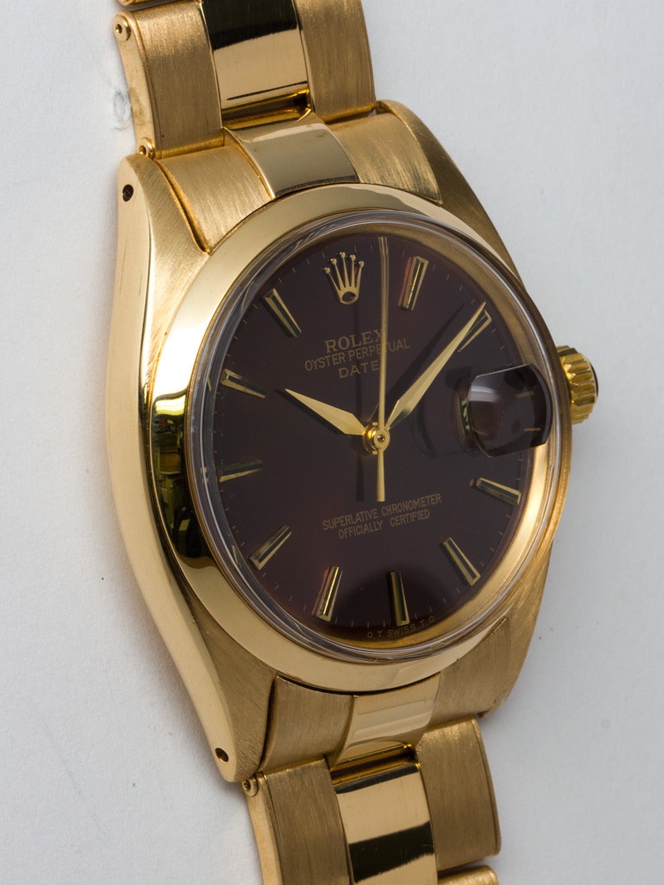 Rolex 18K Yellow Gold Oyster Perpetual Date ref 1500 serial # 5.2 million circa 1978. 34mm diameter case with smooth bezel and acrylic crystal. Custom colored 
