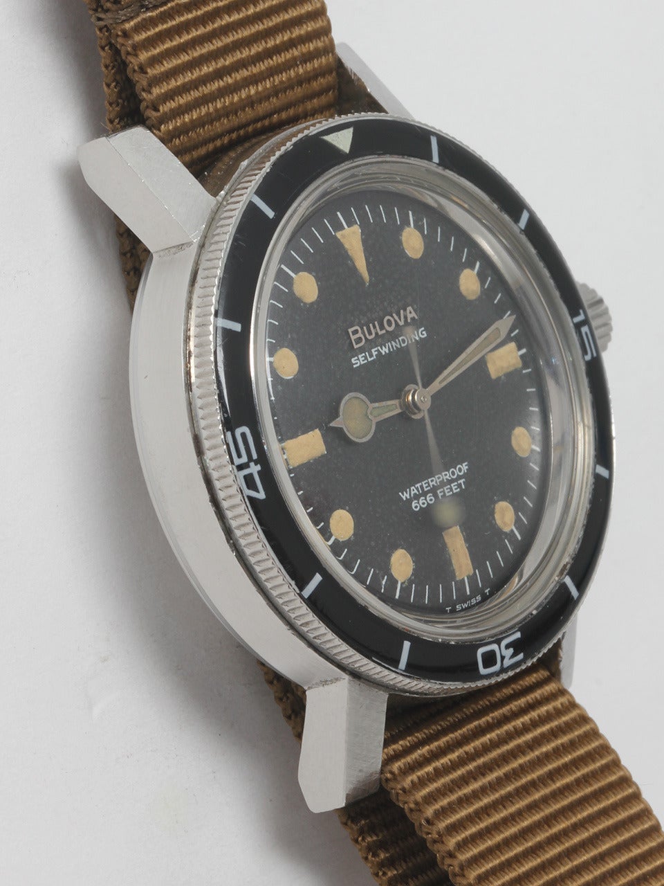 Bulova Stainless Steel Automatic Diver's Wristwatch, circa 1967. Featuring a 37 x 44m screw back case with bakelite bezel and signed crown. Original black dial printed 666ft, warmly patinaed luminous hands. Powered by a self-winding movement with