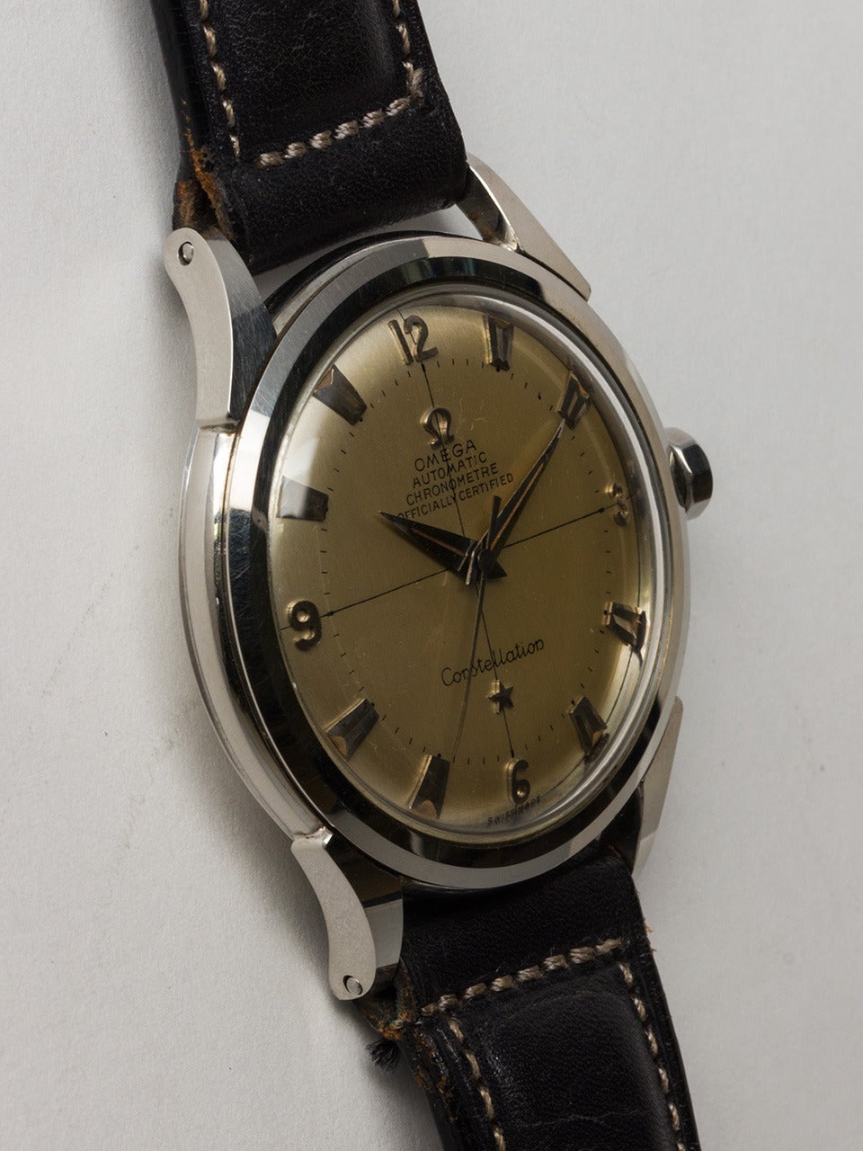 Omega Stainless Steel Constellation Wristwatch circa 1960s. Case measuring 35 x 42mm screw back case with Observatory logo. With beautiful original silvered satin dial with applied silver Arabic and flared indexes, applied Omega logo crown, printed